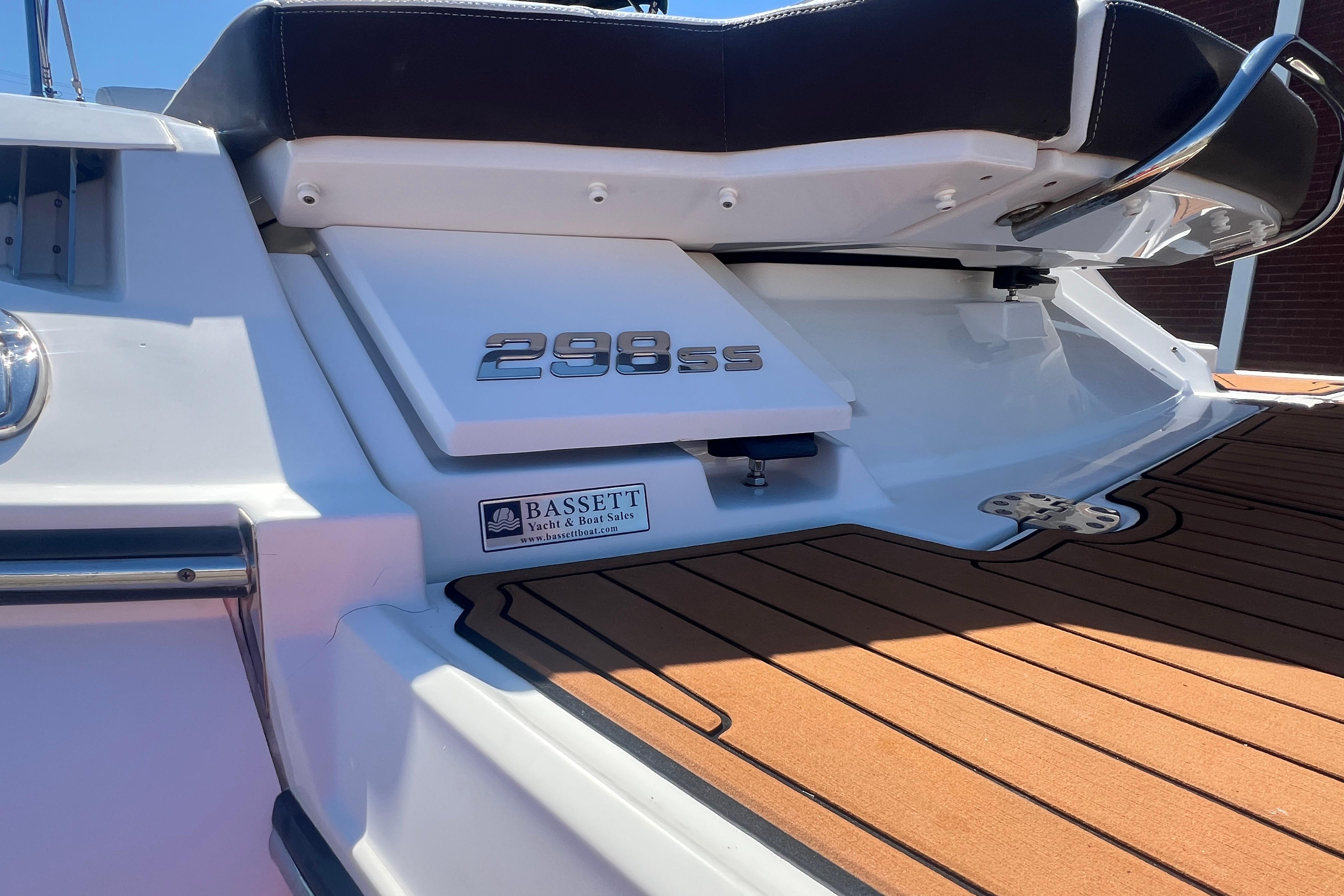 2017 Monterey 298SS Super Sport boat rear view with teak deck and branding.