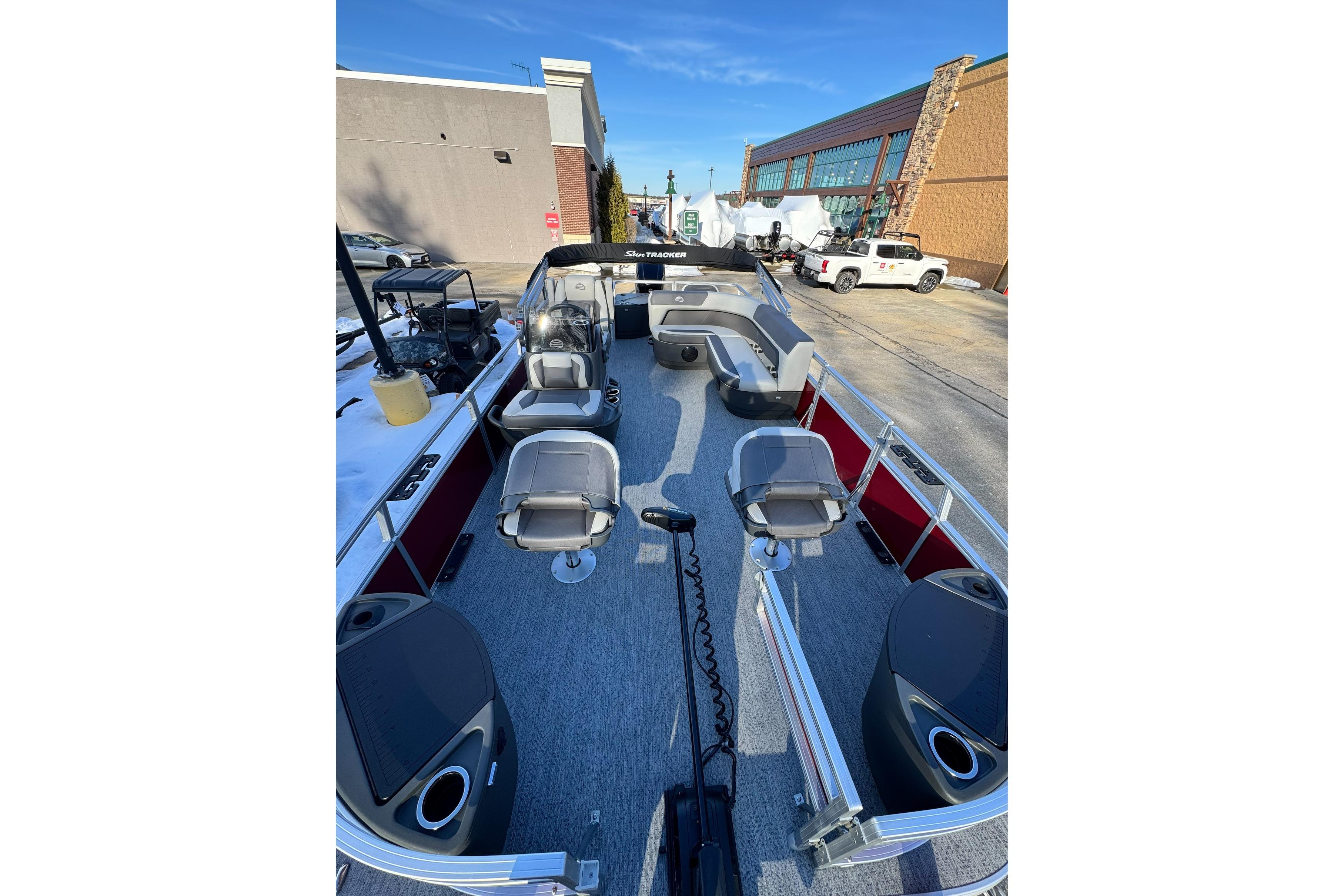 2026 Sun Tracker Bass Buggy 18 DLX pontoon boat with spacious seating and modern design.