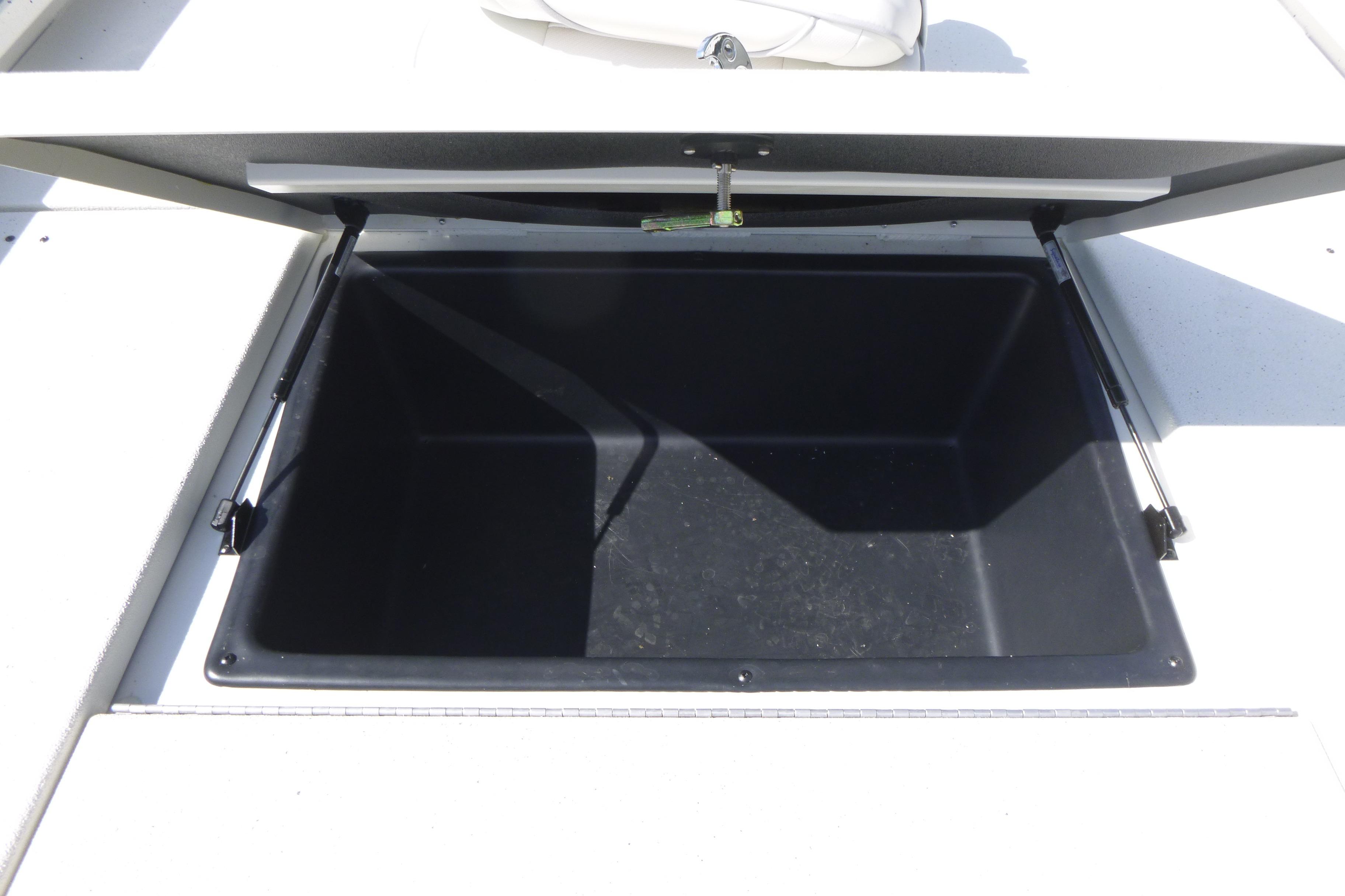 Open storage compartment on 2025 Ranger RB210 boat deck.