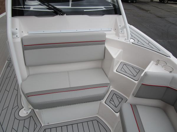 2025 Solara S-250 CW boat interior with gray seating and red accents.