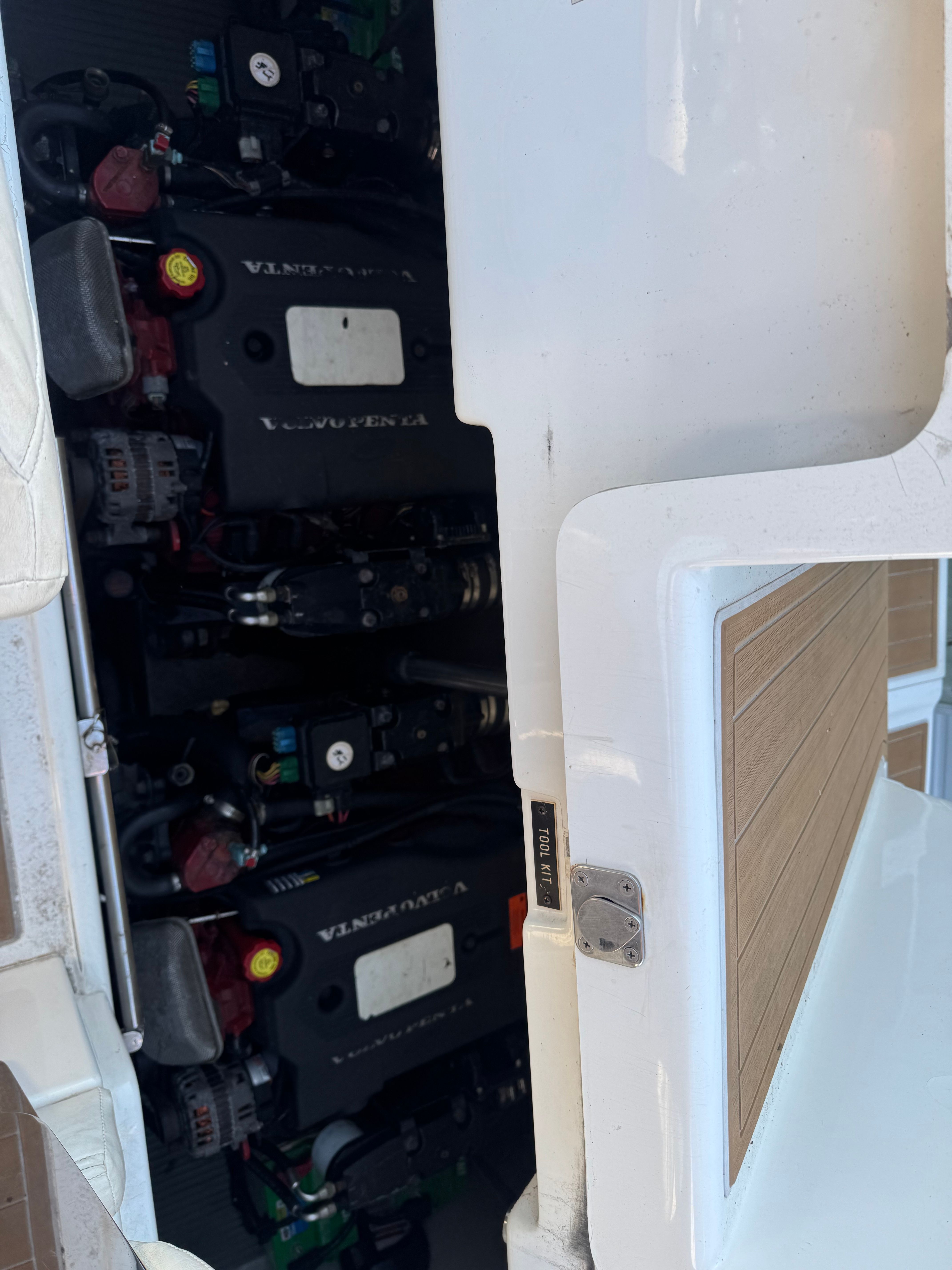 Engine compartment of a 2003 Cobalt 360 boat with two Volvo Penta engines.