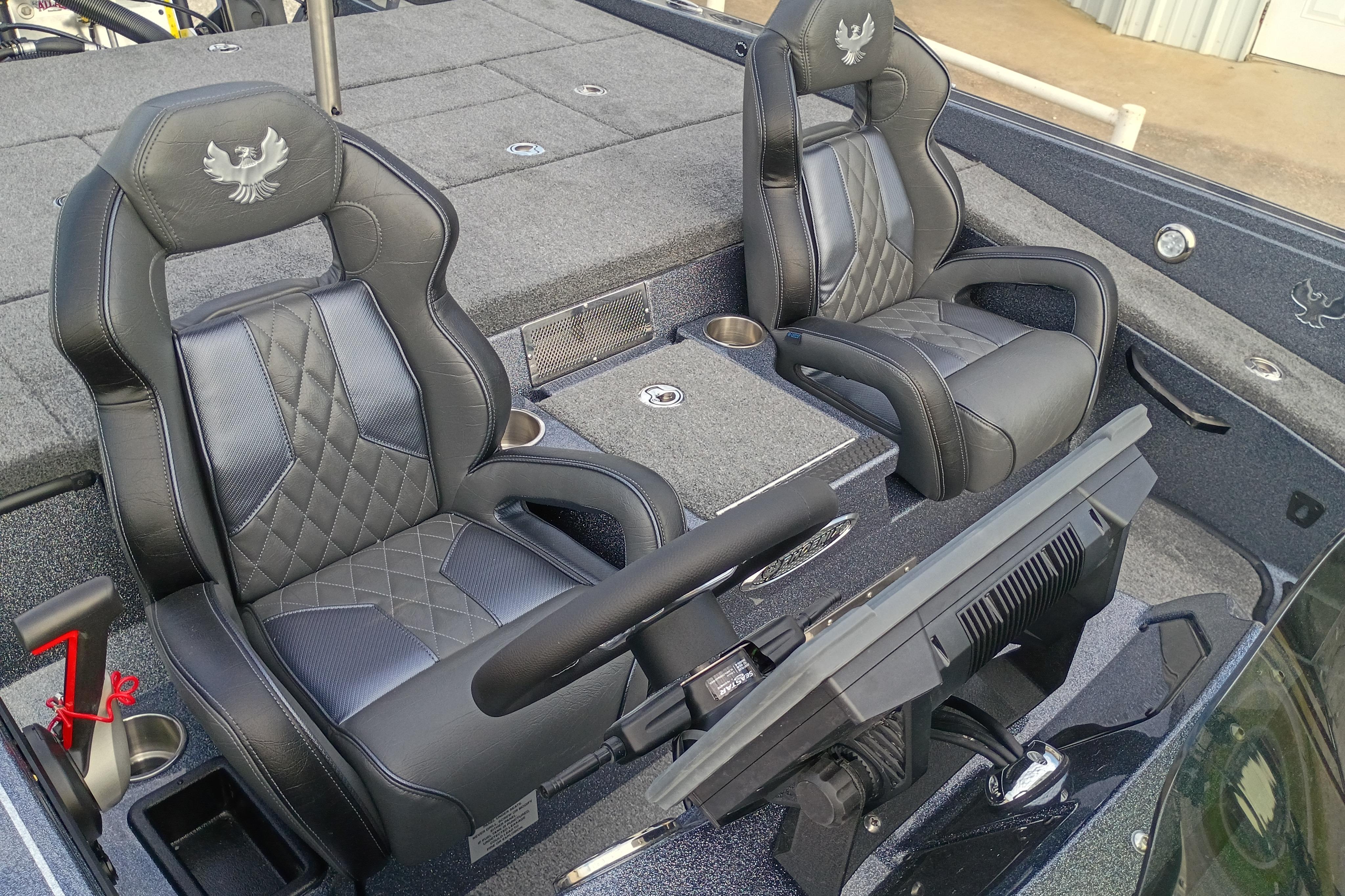 2026 Phoenix 921 ELITEX boat interior with luxurious seating and modern dashboard.