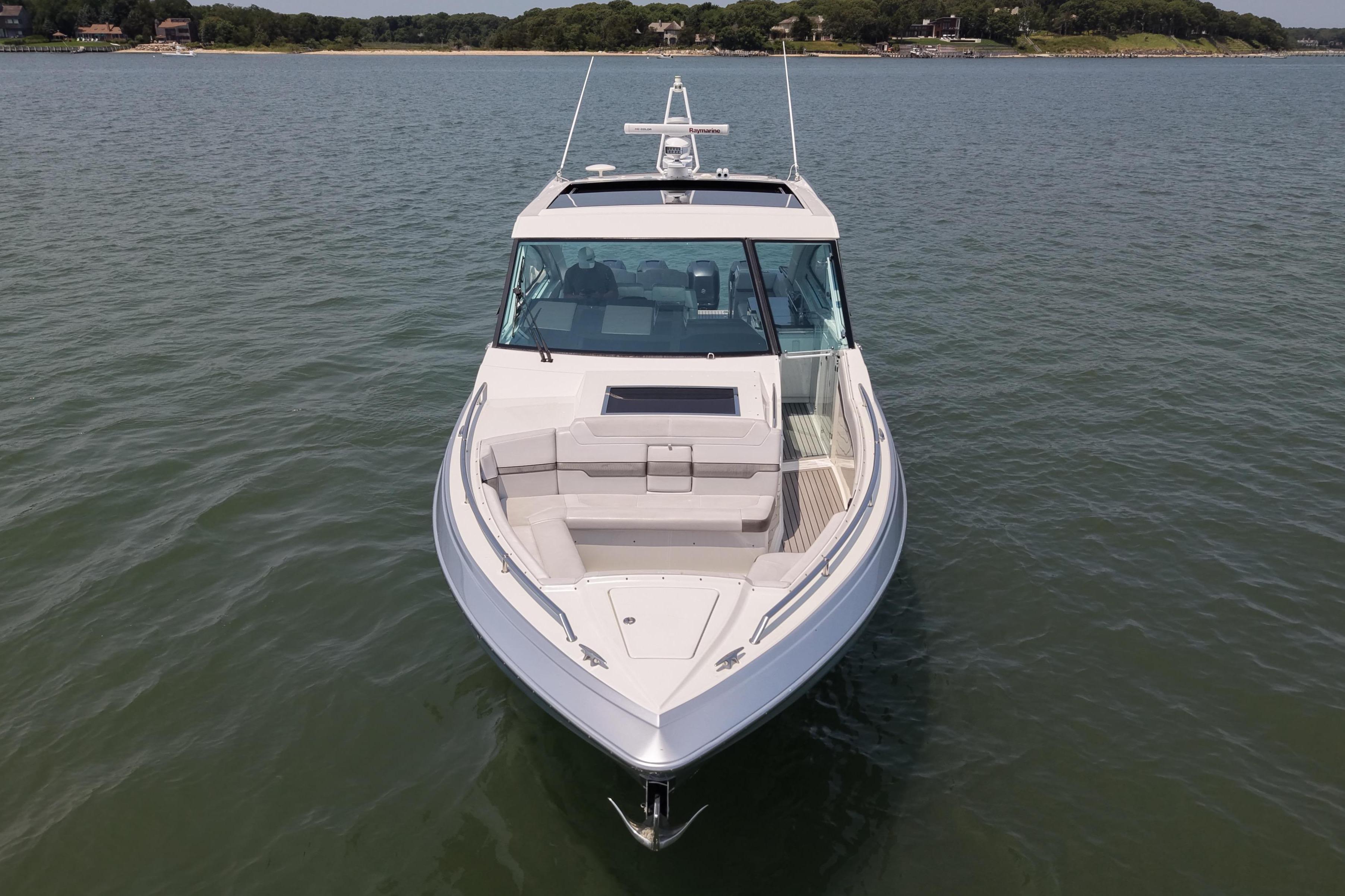 2019 Formula 430 Super Sport Crossover boat on calm water, front view.