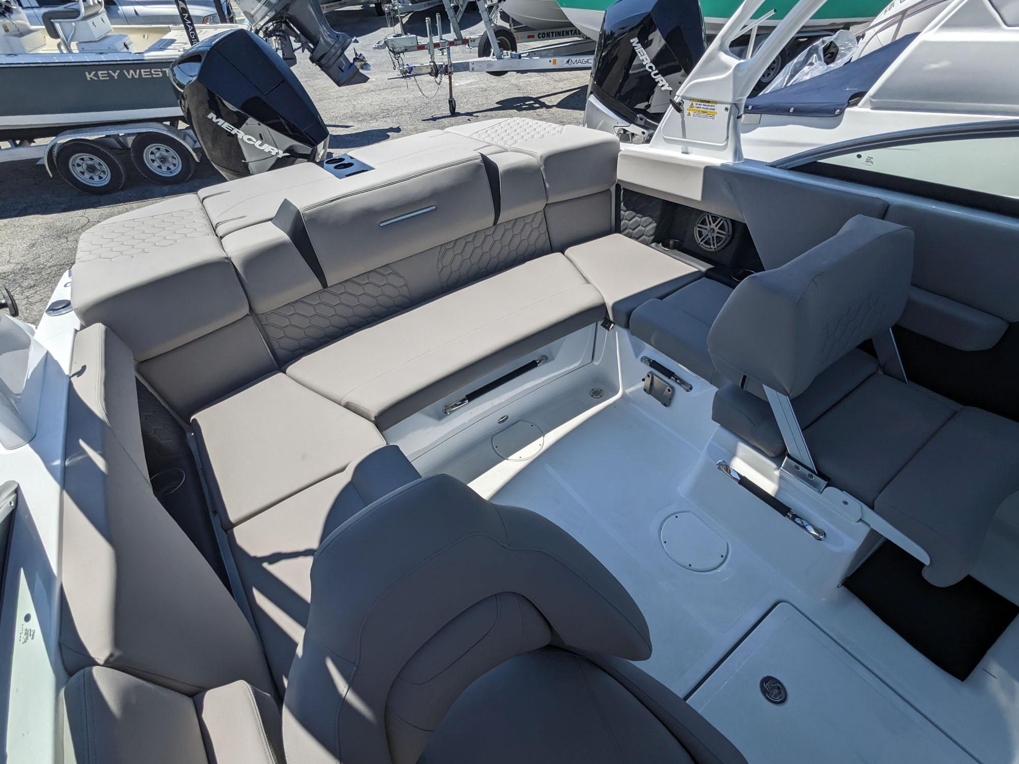 2023 Four Winns H2 boat interior with gray seating and white deck.