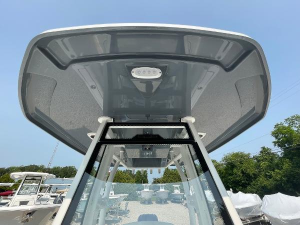 2025 Tidewater 232 CC Adventure boat, showcasing sleek T-top design and modern features.