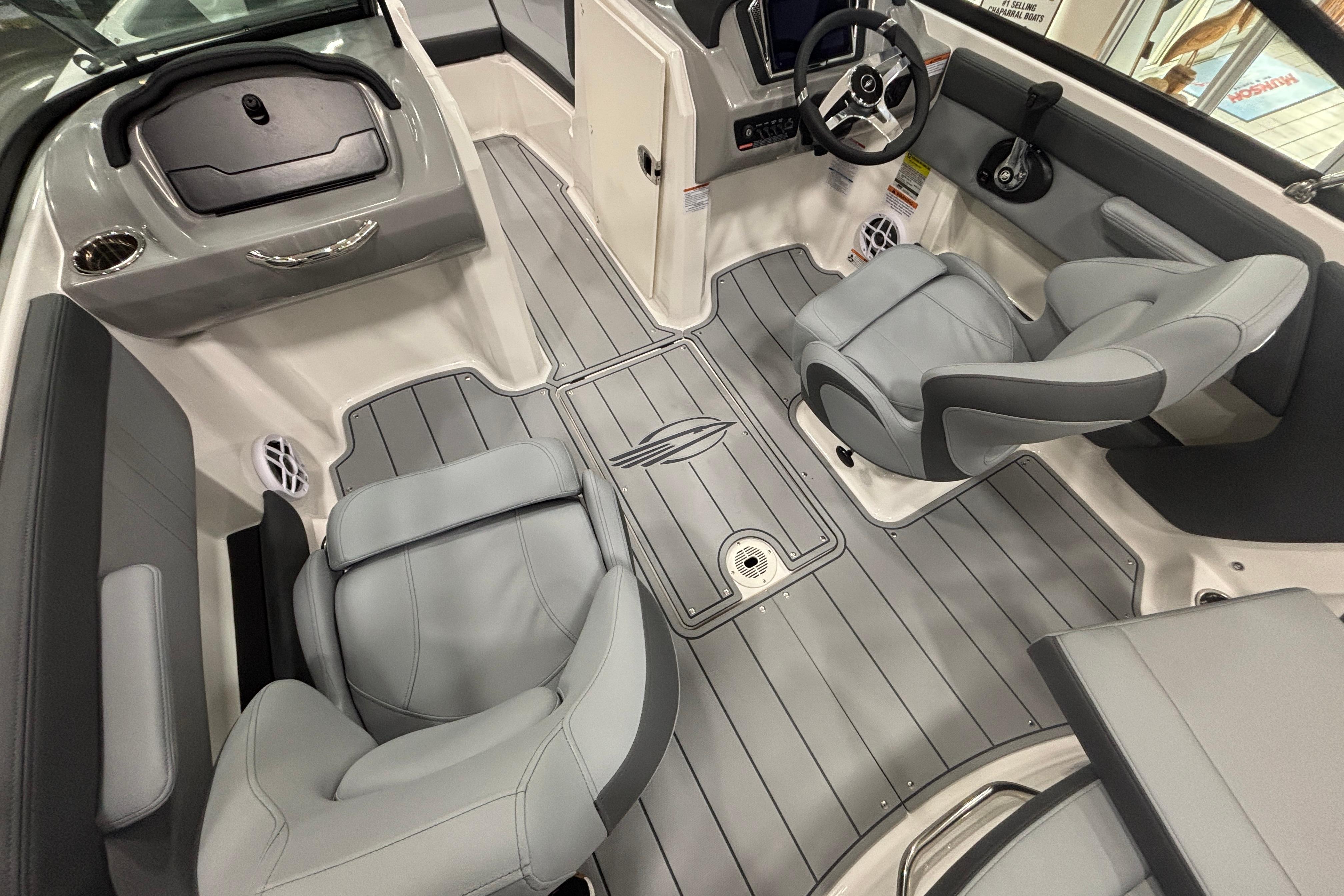 Interior of 2026 Chaparral 21 SSi with gray seating.