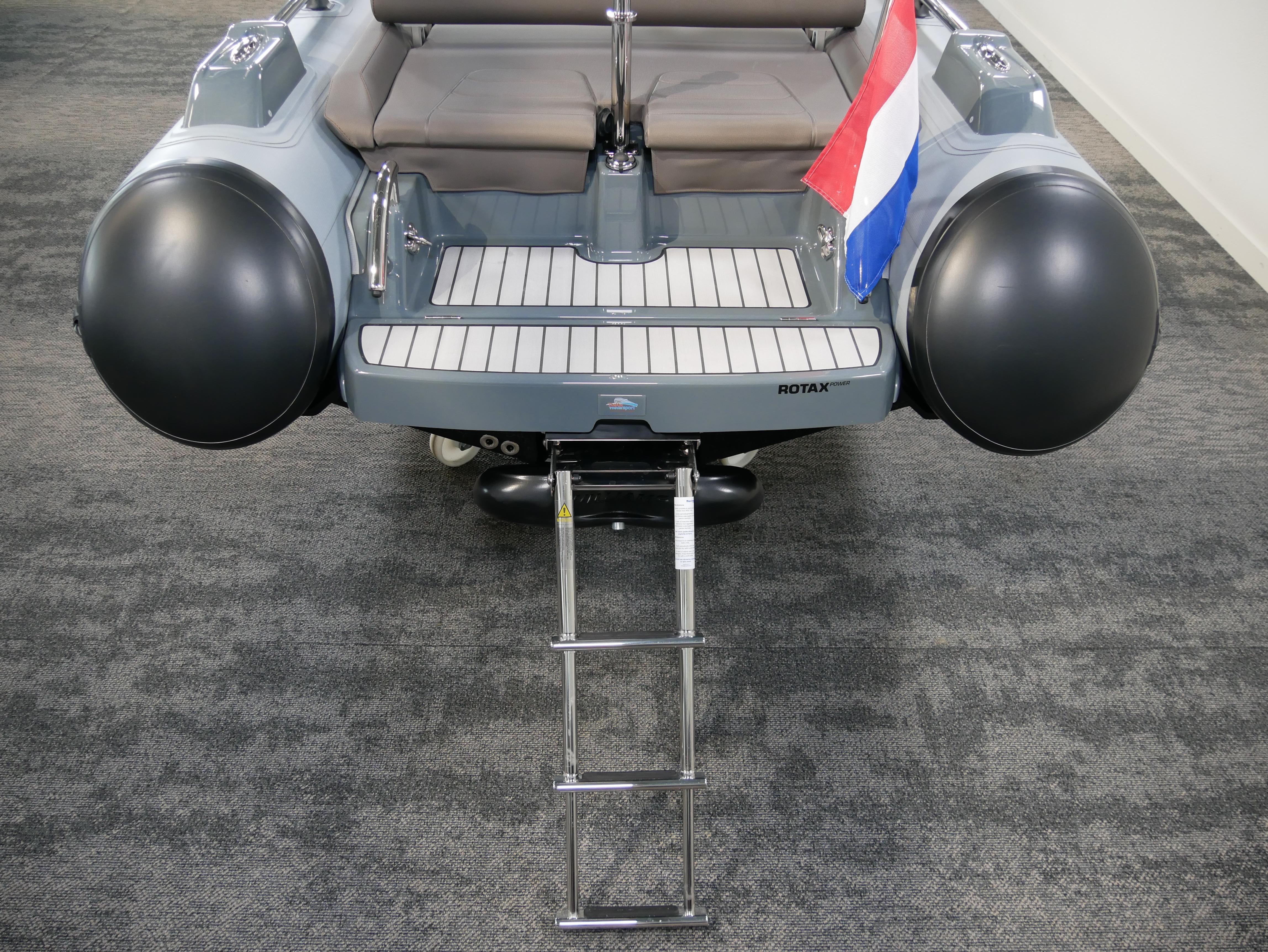 2025 Williams Jet Tenders SportJet 435 rear view with ladder and flag.