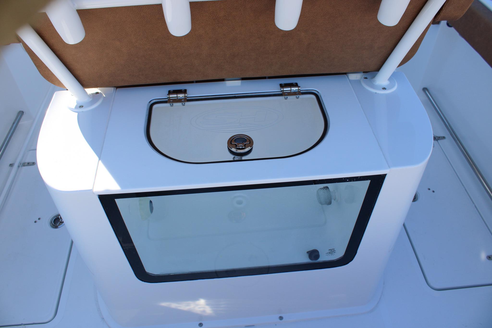 2026 Sea Hunt Gamefish 25 boat interior with storage compartment and seating.