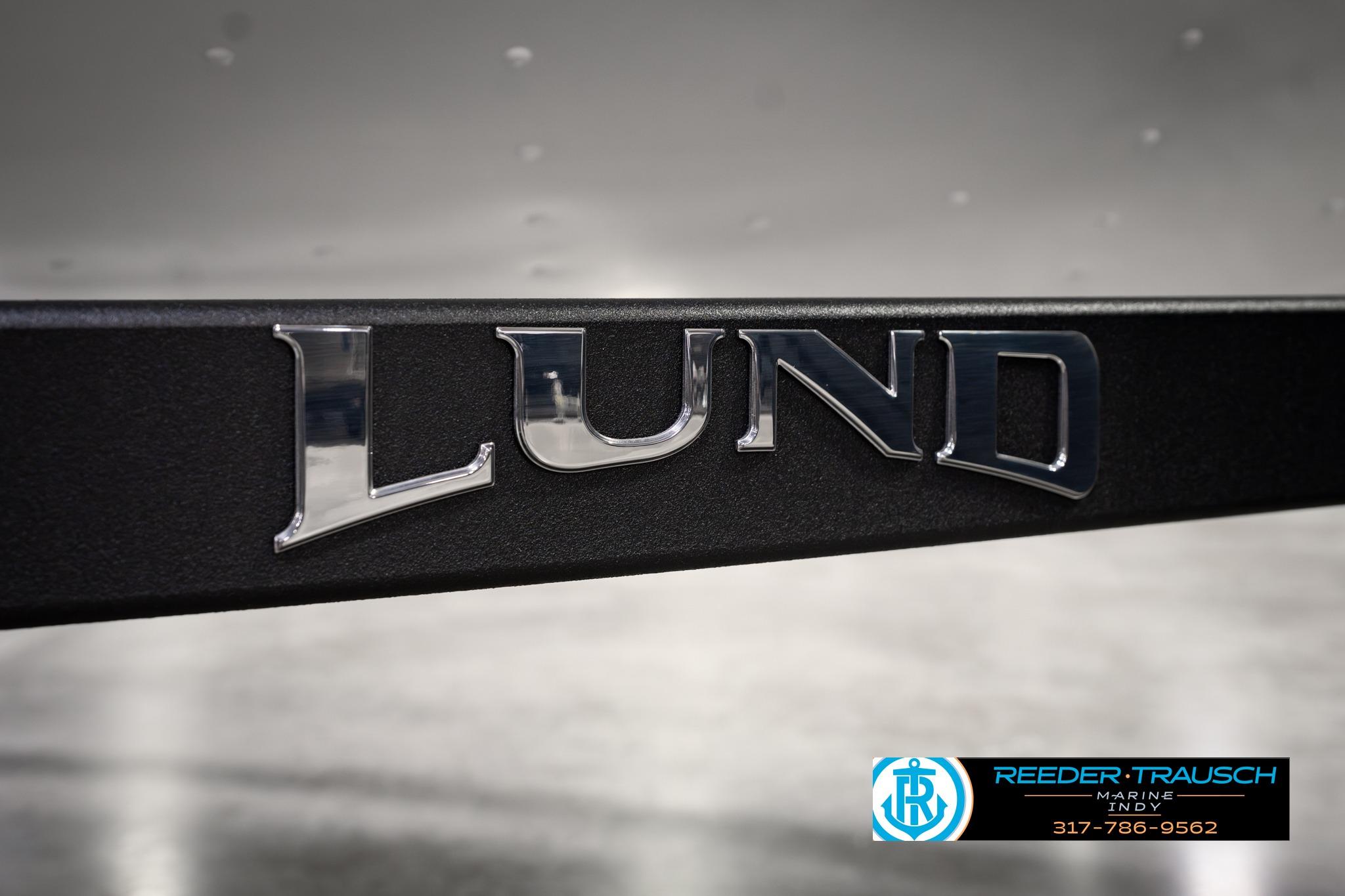 Close-up of 2026 Lund 1650 Rebel XL SS logo on a sleek black surface.