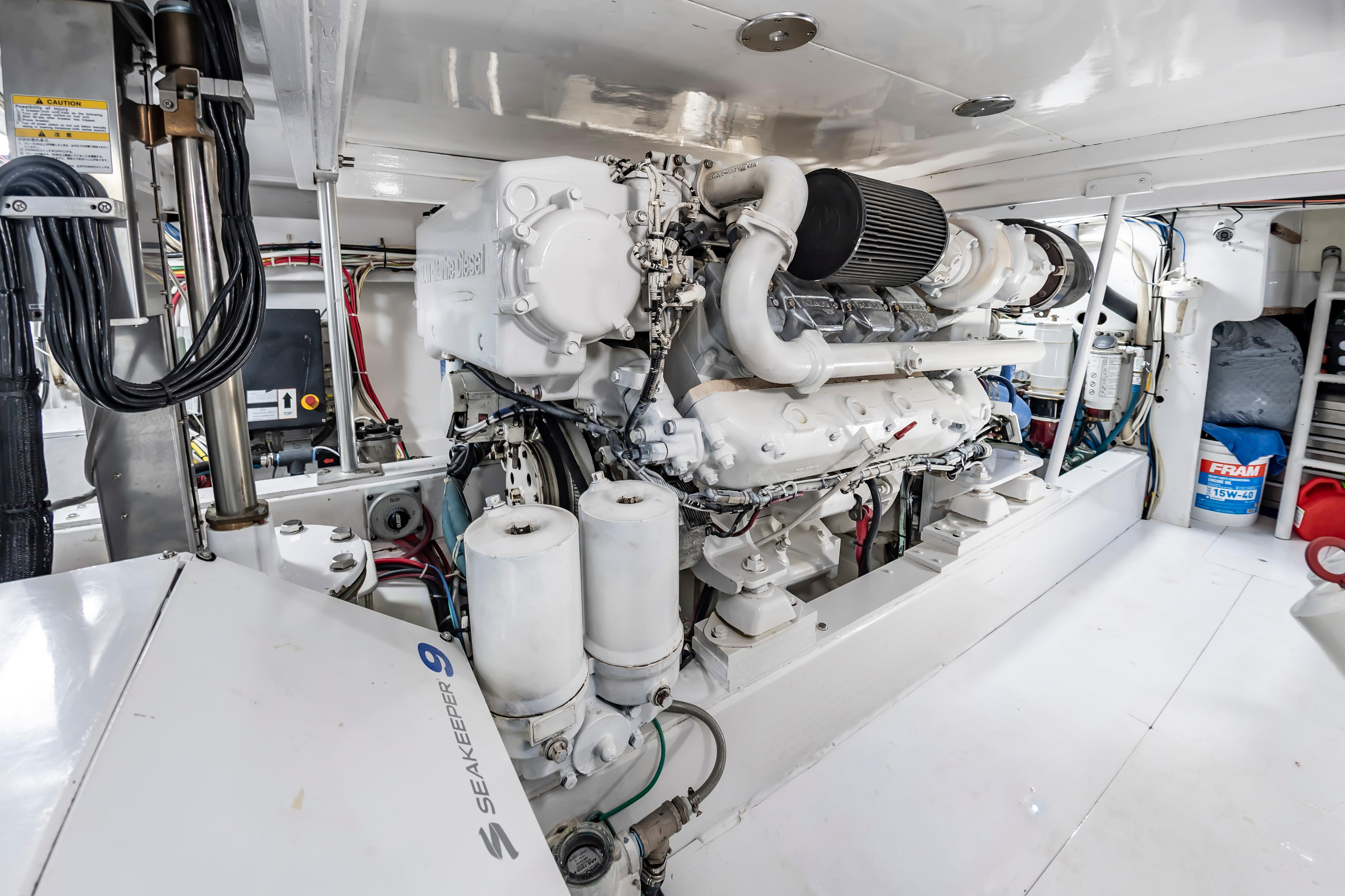 Engine room of 1993 Custom Carolina Scarborough 56 Convertible yacht, featuring Seakeeper 9 stabilizer.