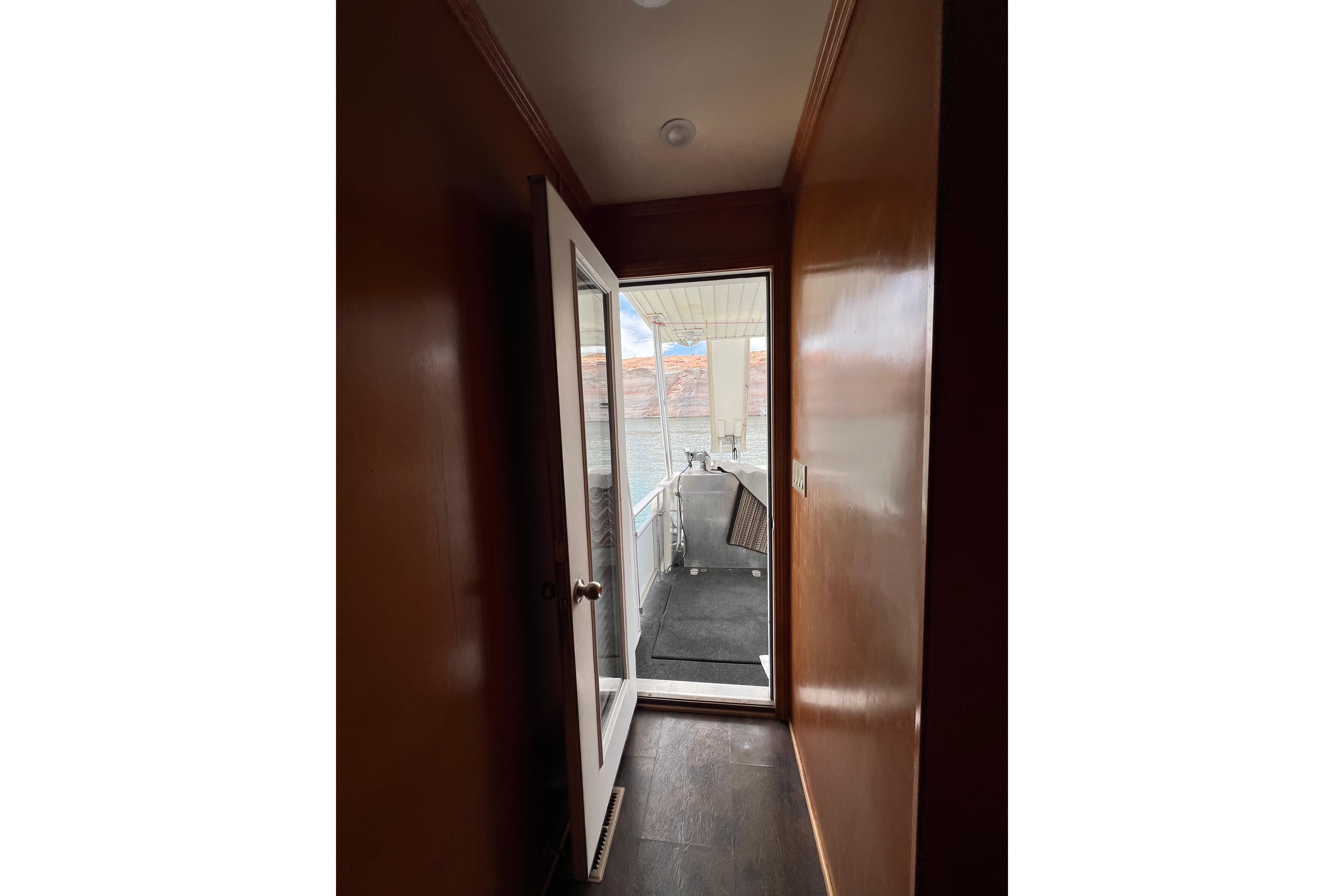 Hallway view leading to deck on 2013 Destination Yacht Lotta Yachta.