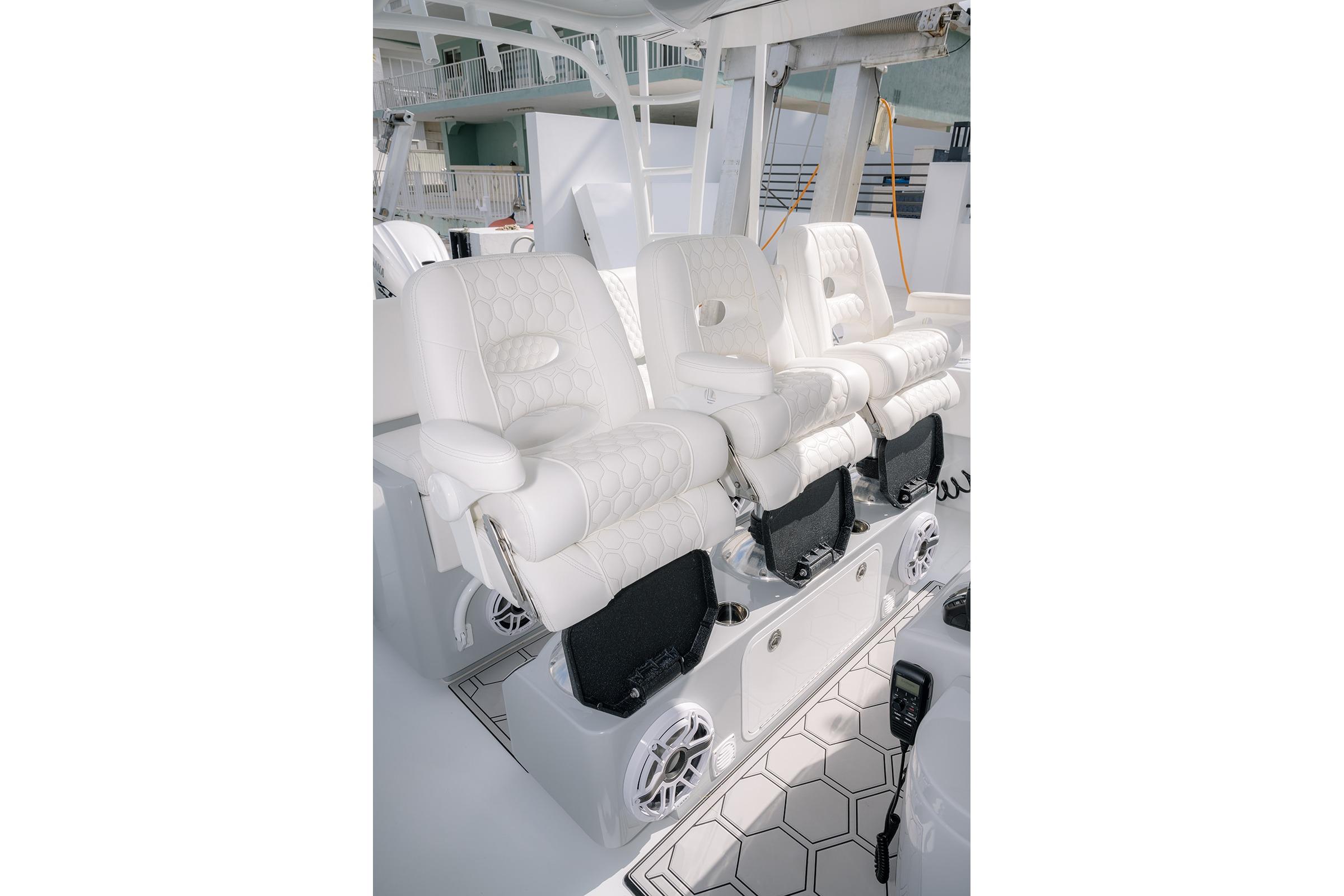 2024 Contender 44 ST boat interior with luxurious white seating and modern design.