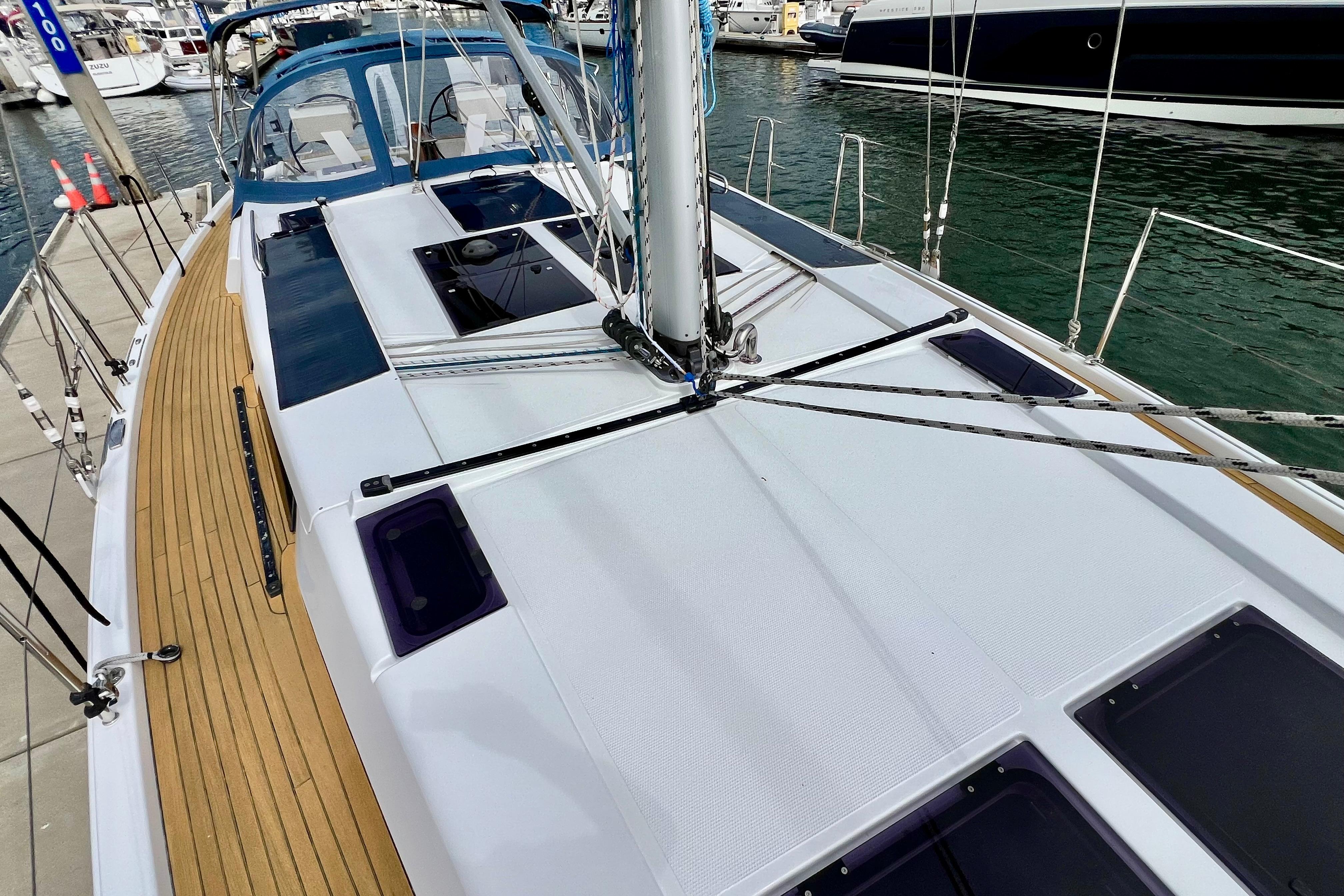 2016 Hanse 455 sailboat docked, showcasing sleek deck design and modern features.