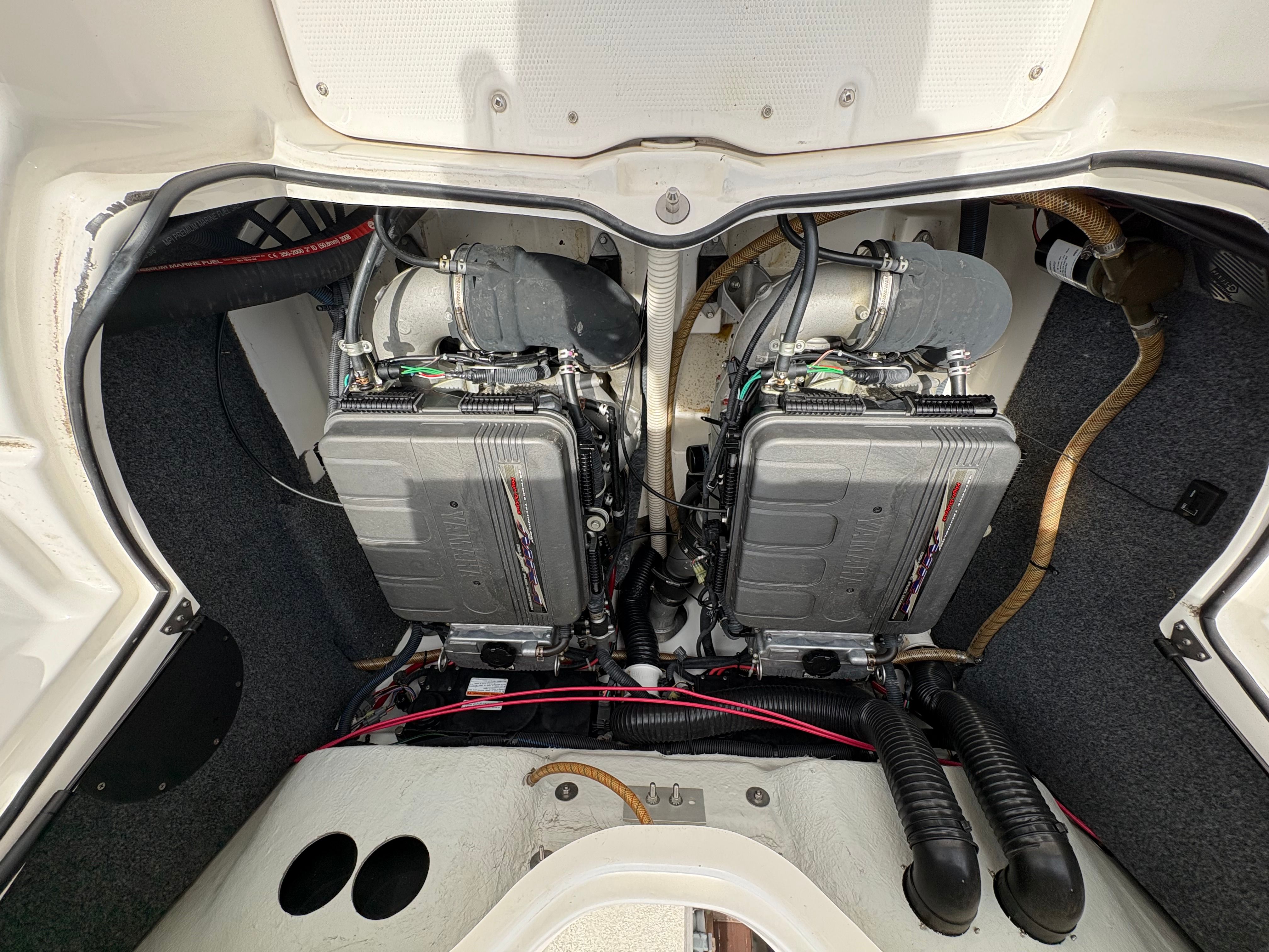 Engine compartment of a 2009 Yamaha Boats 212X with dual engines.