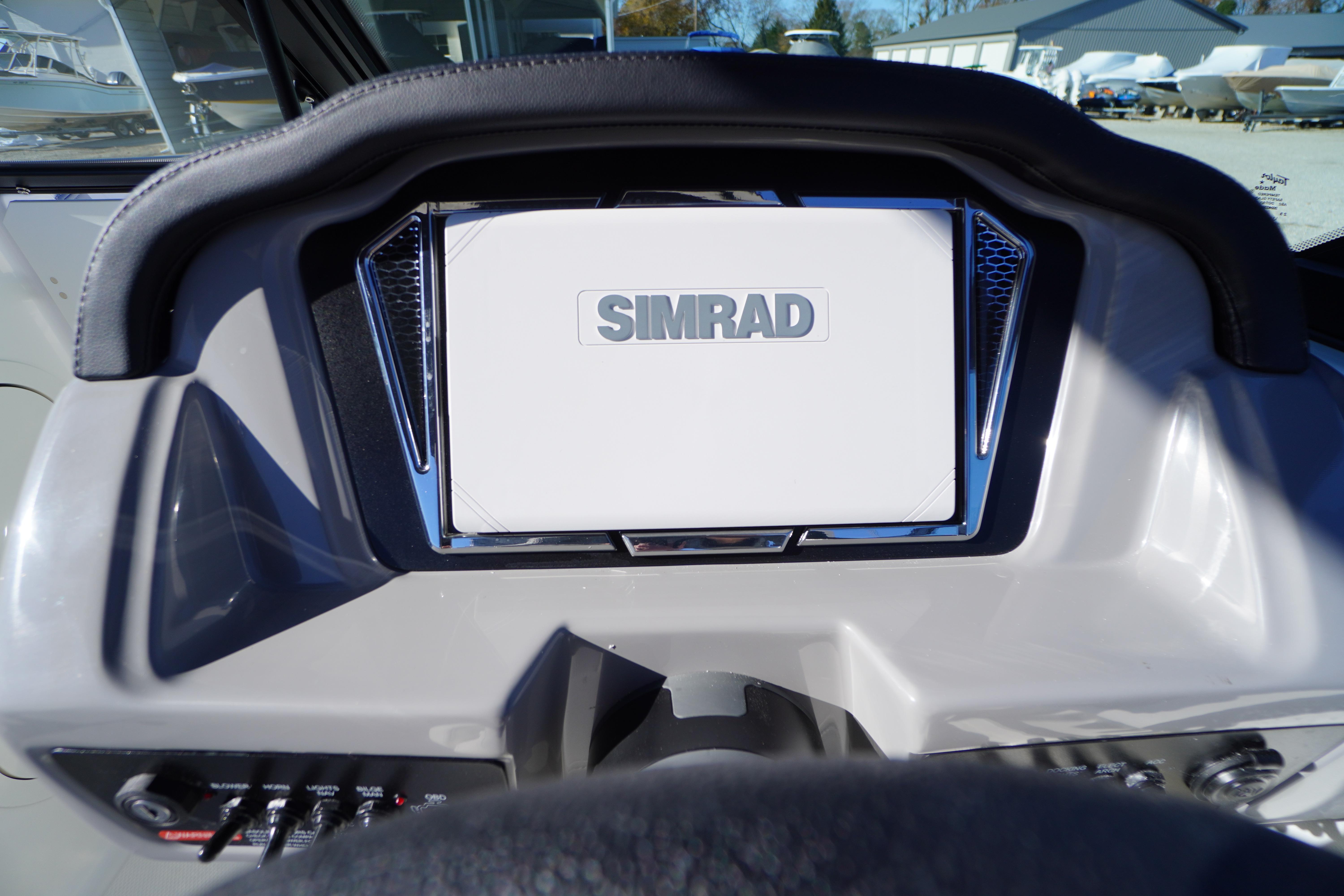 Dashboard of 2026 Chaparral 23 SSi boat featuring Simrad display.