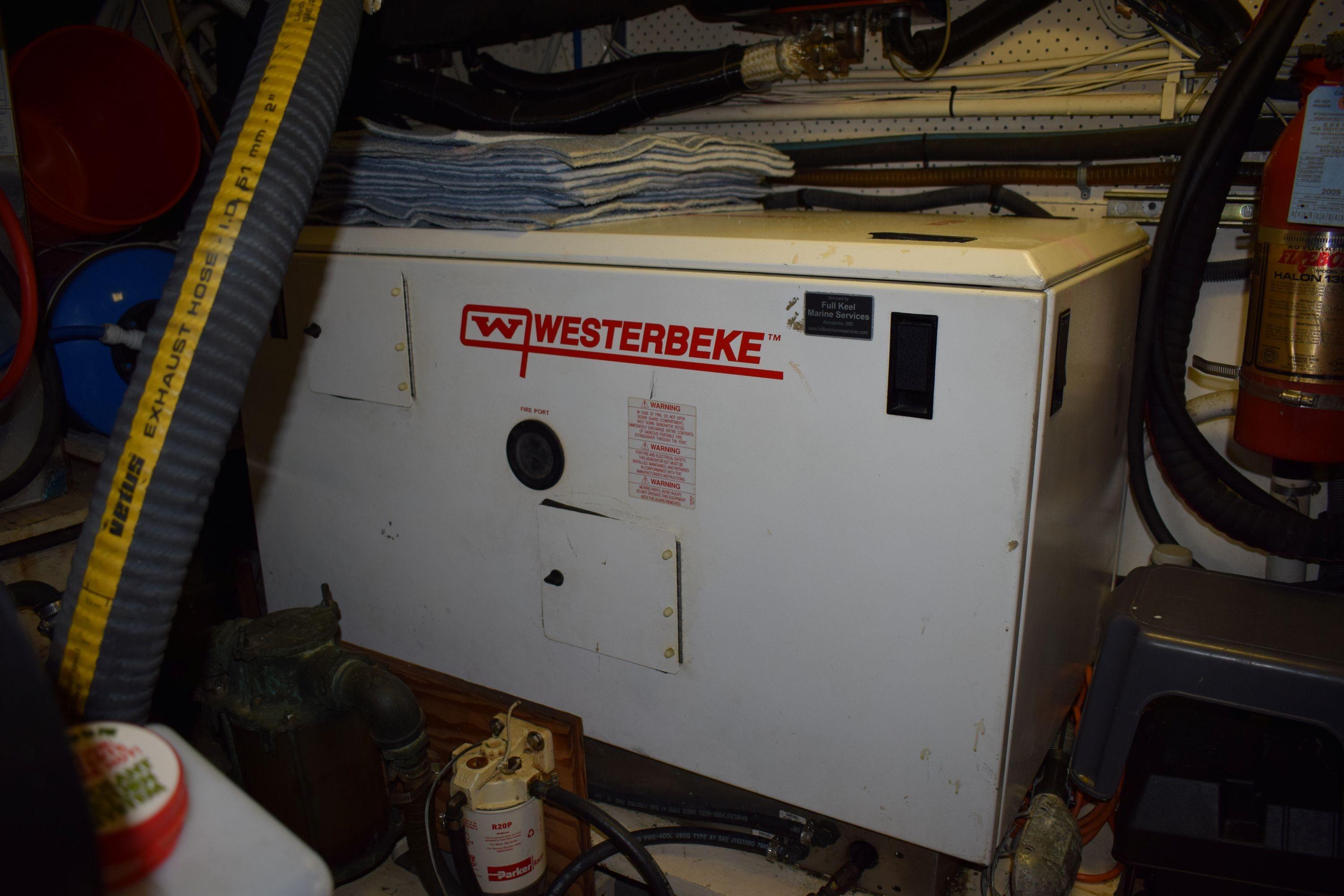 Engine room of 1980 Cheoy Lee 52 Motorsailer with Westerbeke generator.