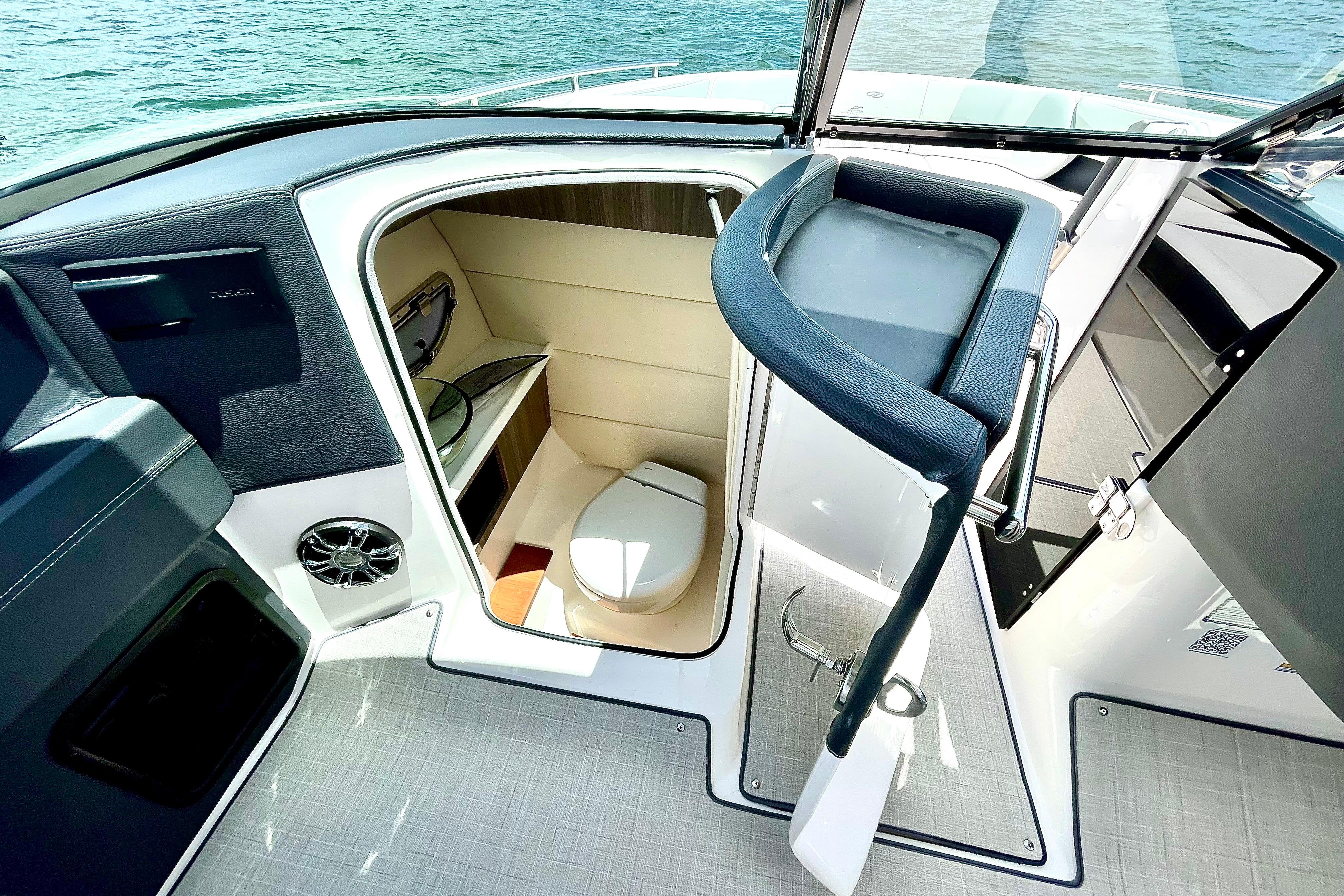 2023 Regal 29 OBX boat interior with compact bathroom and modern amenities.