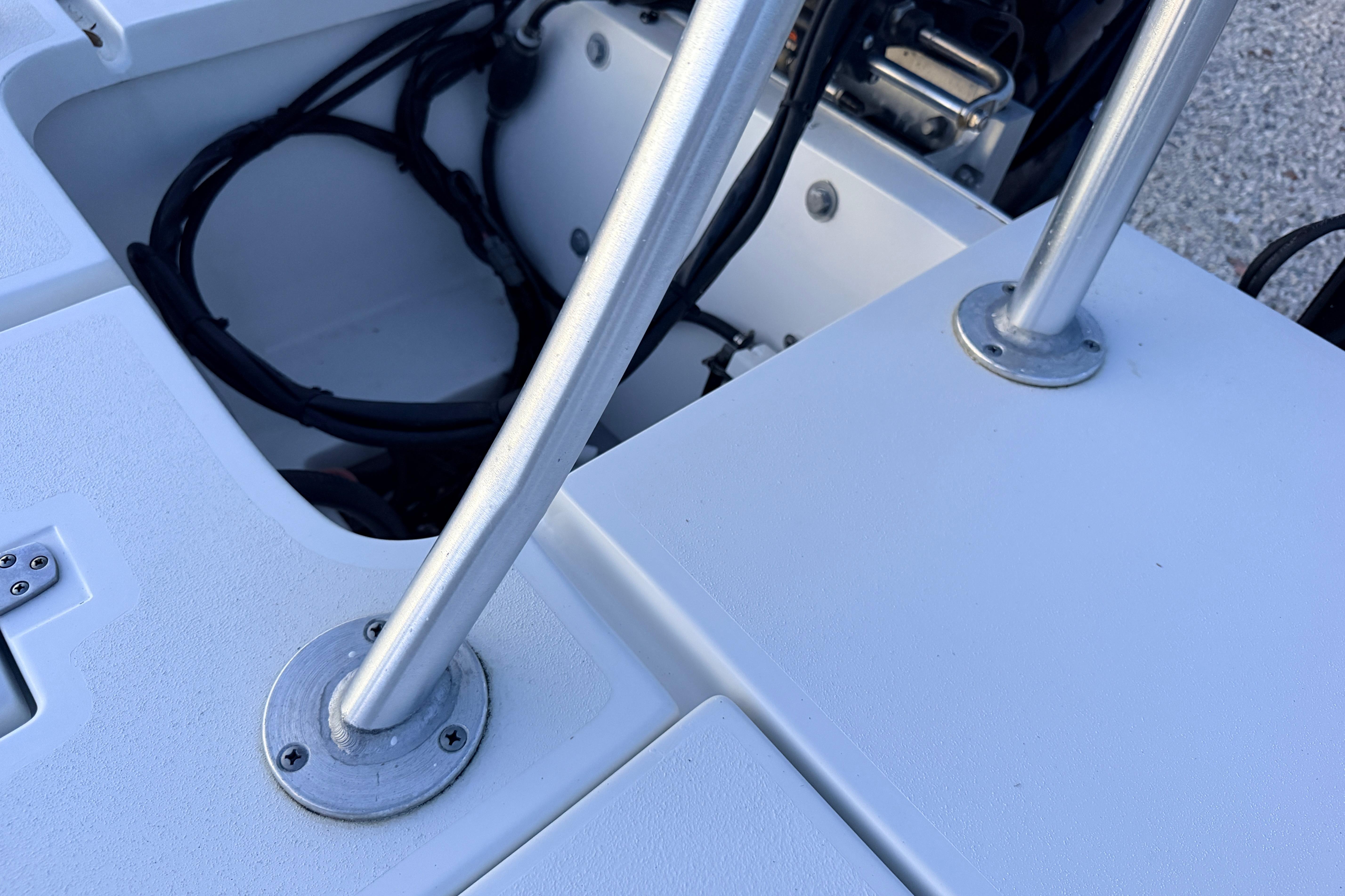 Close-up of 2019 Mitzi Skiffs 17 boat deck with metal supports and wiring.