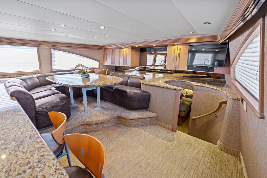 Luxurious interior of a 1999 Westport 112 yacht with elegant seating area.