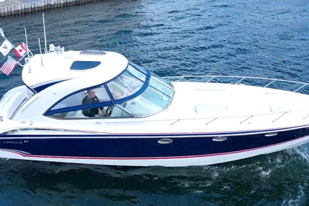 2008 Formula 400 Super Sport boat cruising on open water.