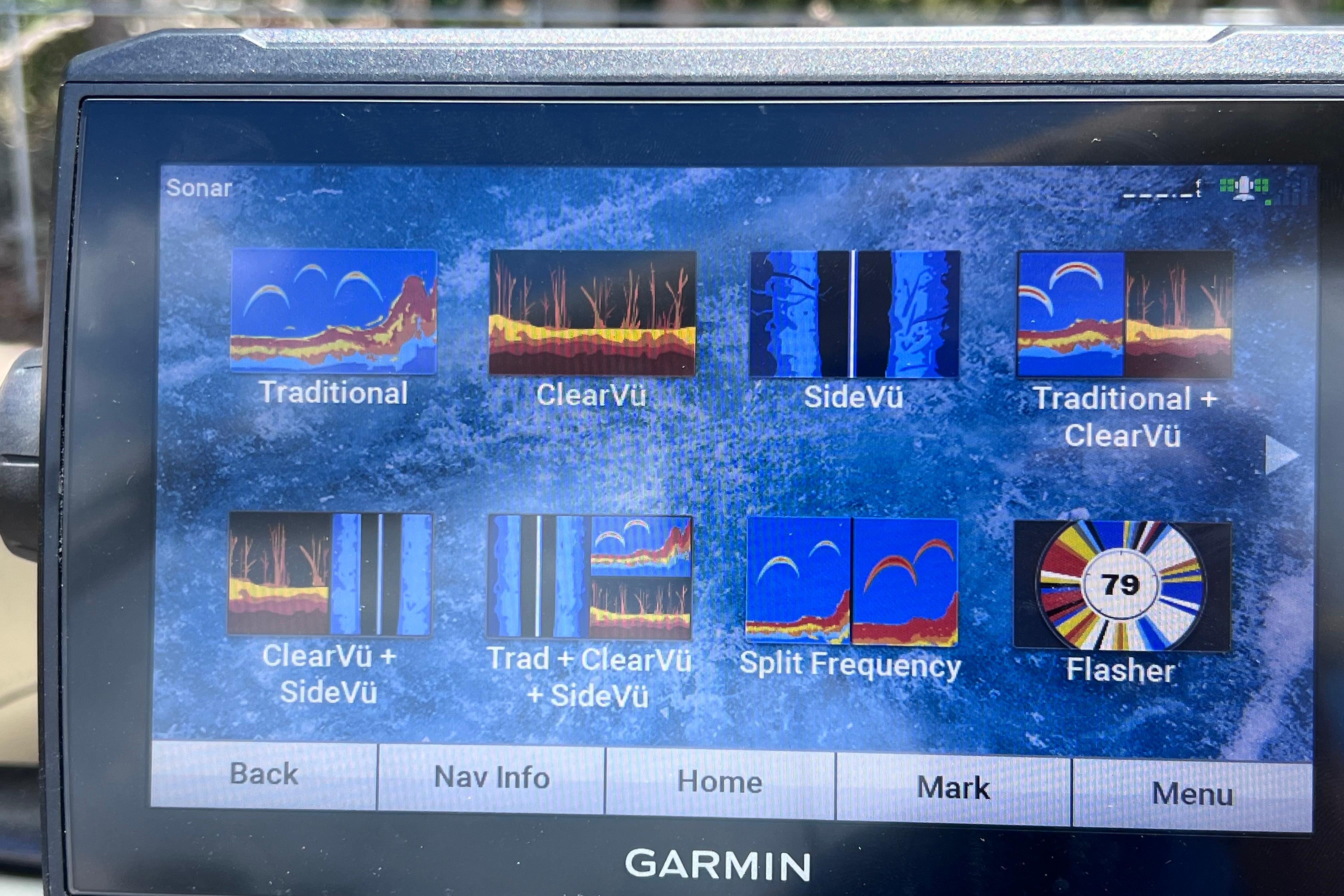 Garmin sonar display on 2023 Sun Tracker Fishin' Barge 22 DLX, showing various sonar modes.