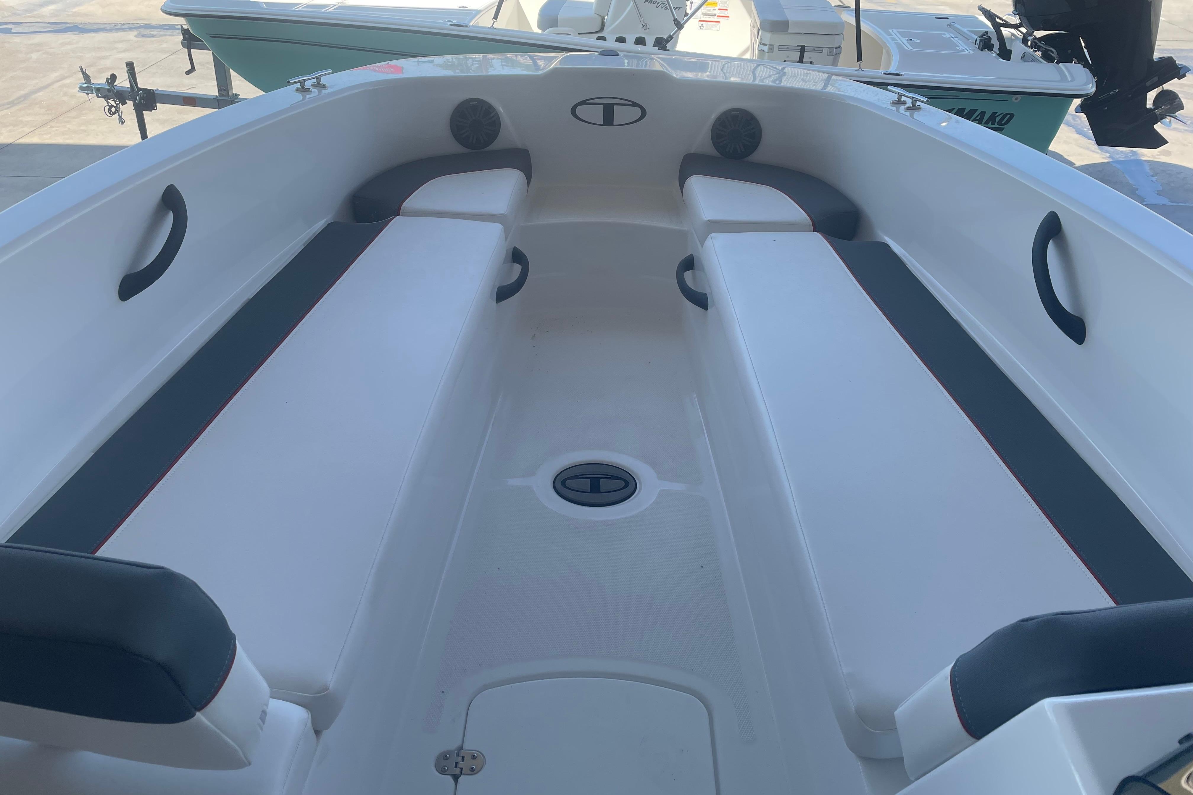 2026 Tahoe T18 boat interior with cushioned seating and sleek design.