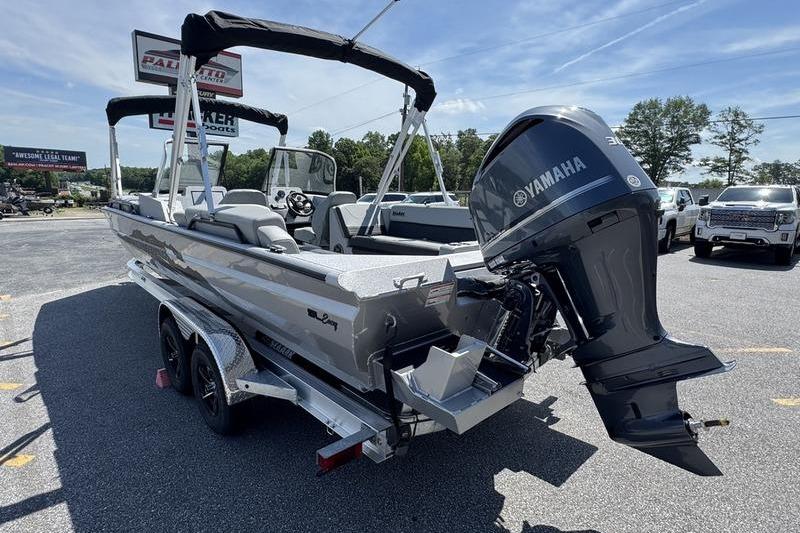 2025 SeaArk Super Lounge Easy boat with Yamaha motor, parked on a trailer.