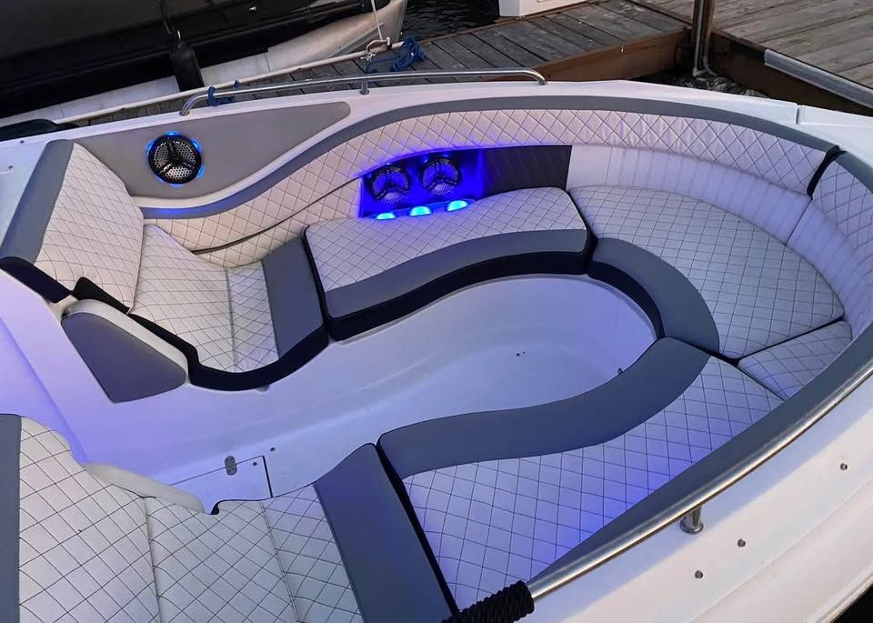 Interior of 2016 Cruisers Sport Series 29SS boat with blue lighting.