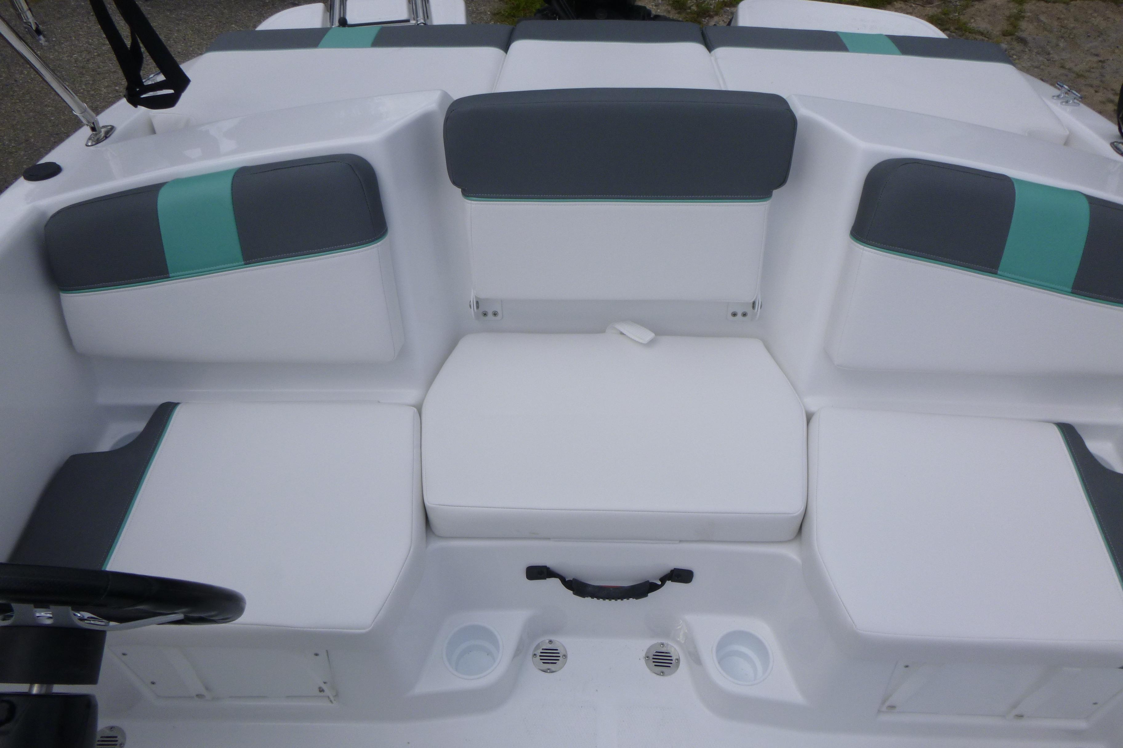 2026 Tahoe T16 boat interior with white and gray seating, teal accents.
