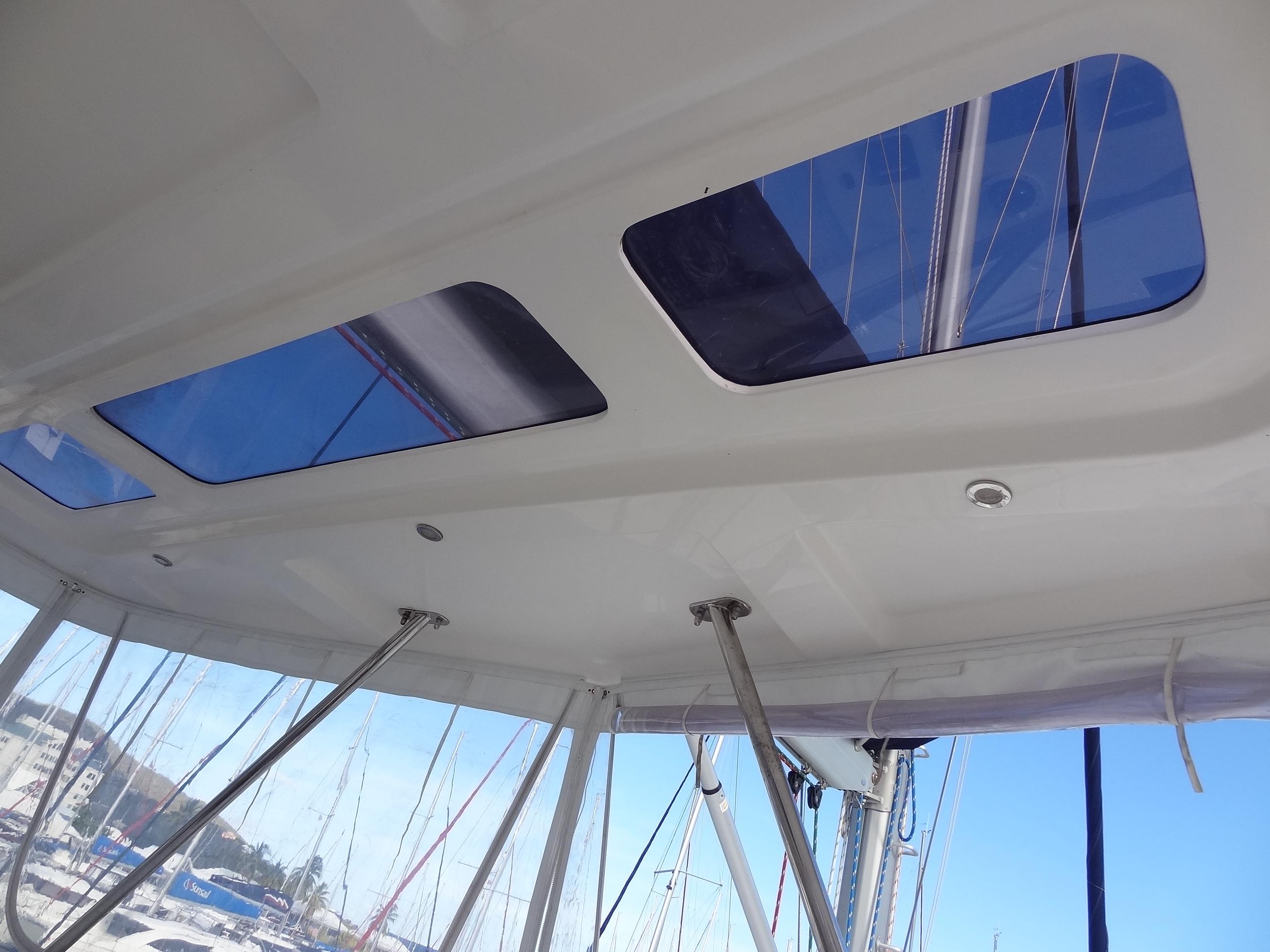 2014 Leopard 58 yacht ceiling with skylights and marina view.