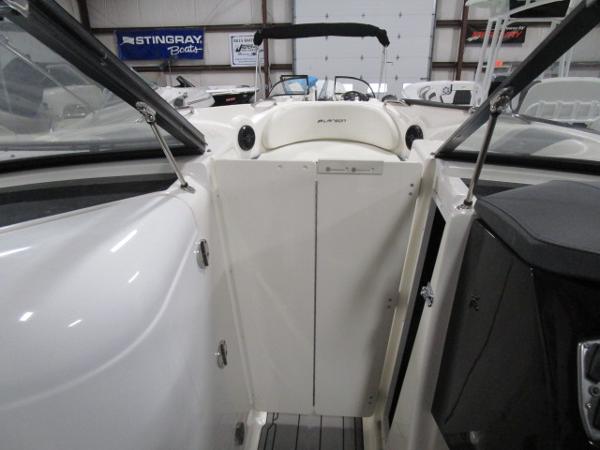 2017 Larson 292 LXI boat interior with open cockpit and seating area.