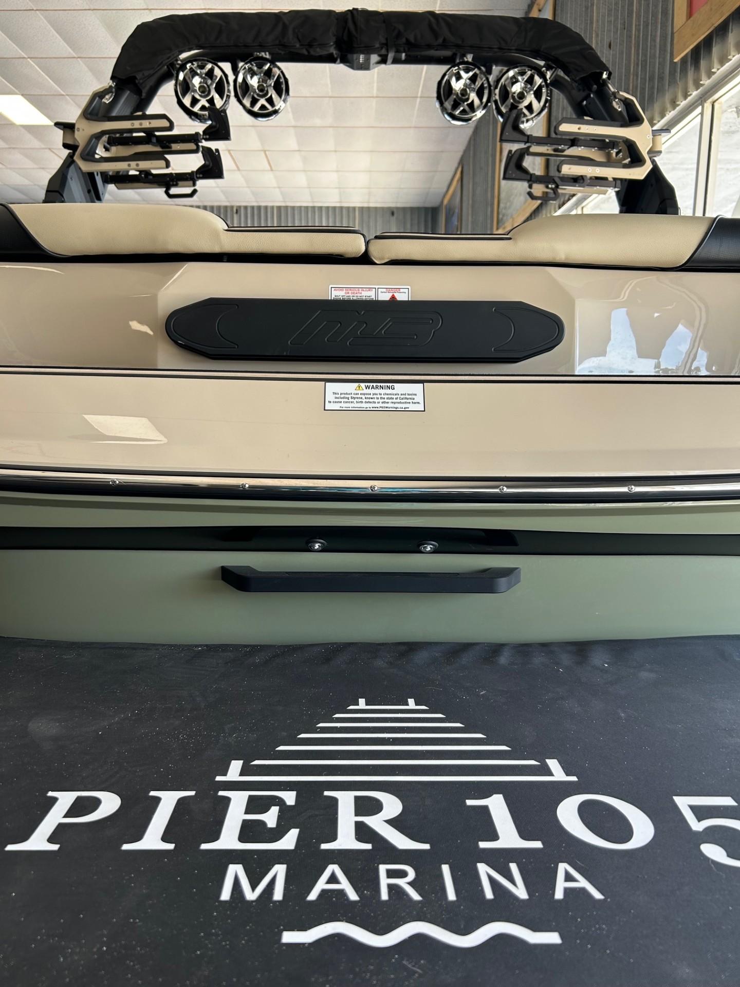 2024 MB F22 Tomcat boat at Pier 105 Marina, featuring sleek design and modern audio system.