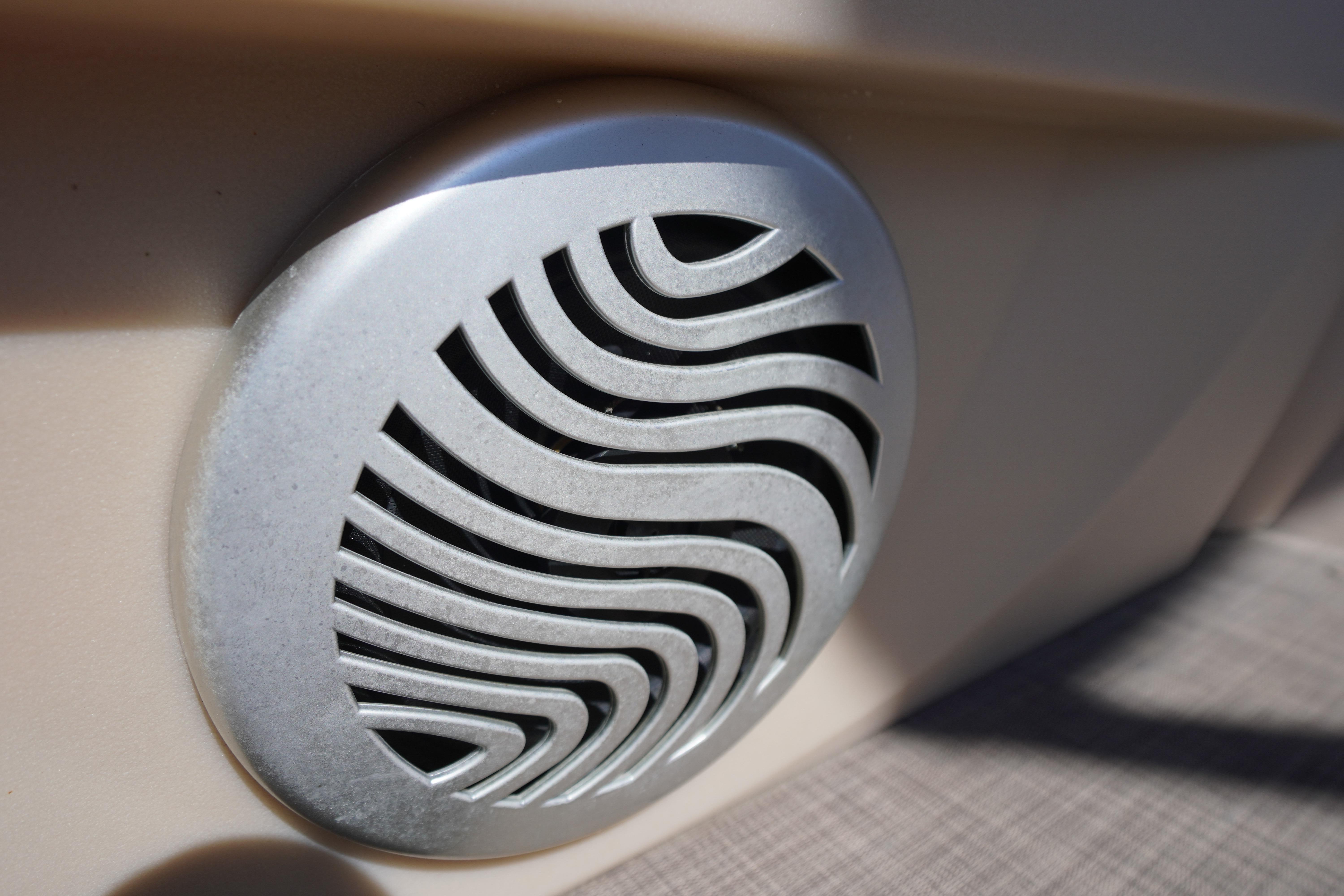 Close-up of a speaker grille on a 2019 SUNTRACKER Fishin' Barge 22 DLX boat.