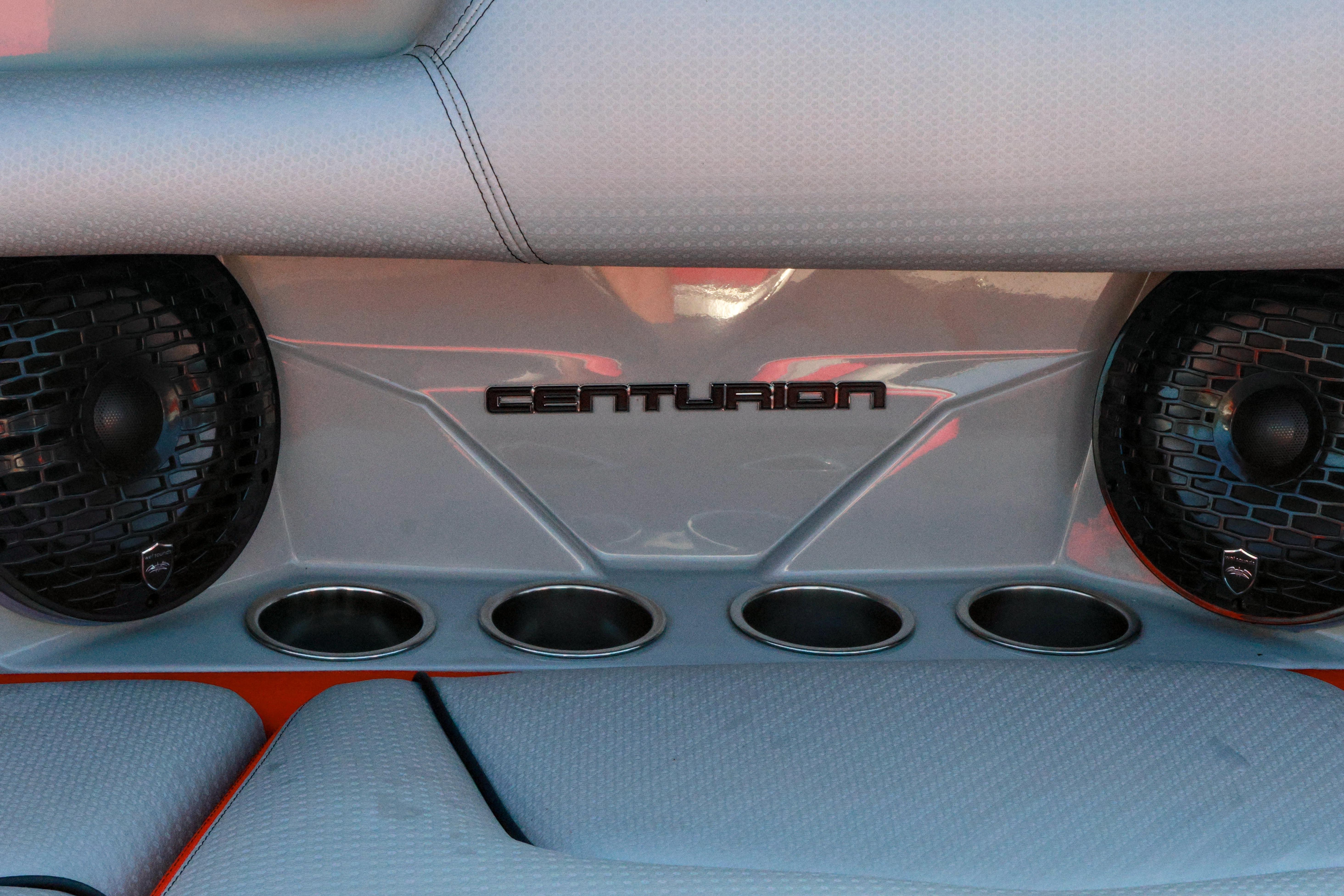 2024 Centurion Fi23 boat interior with speakers and cup holders.