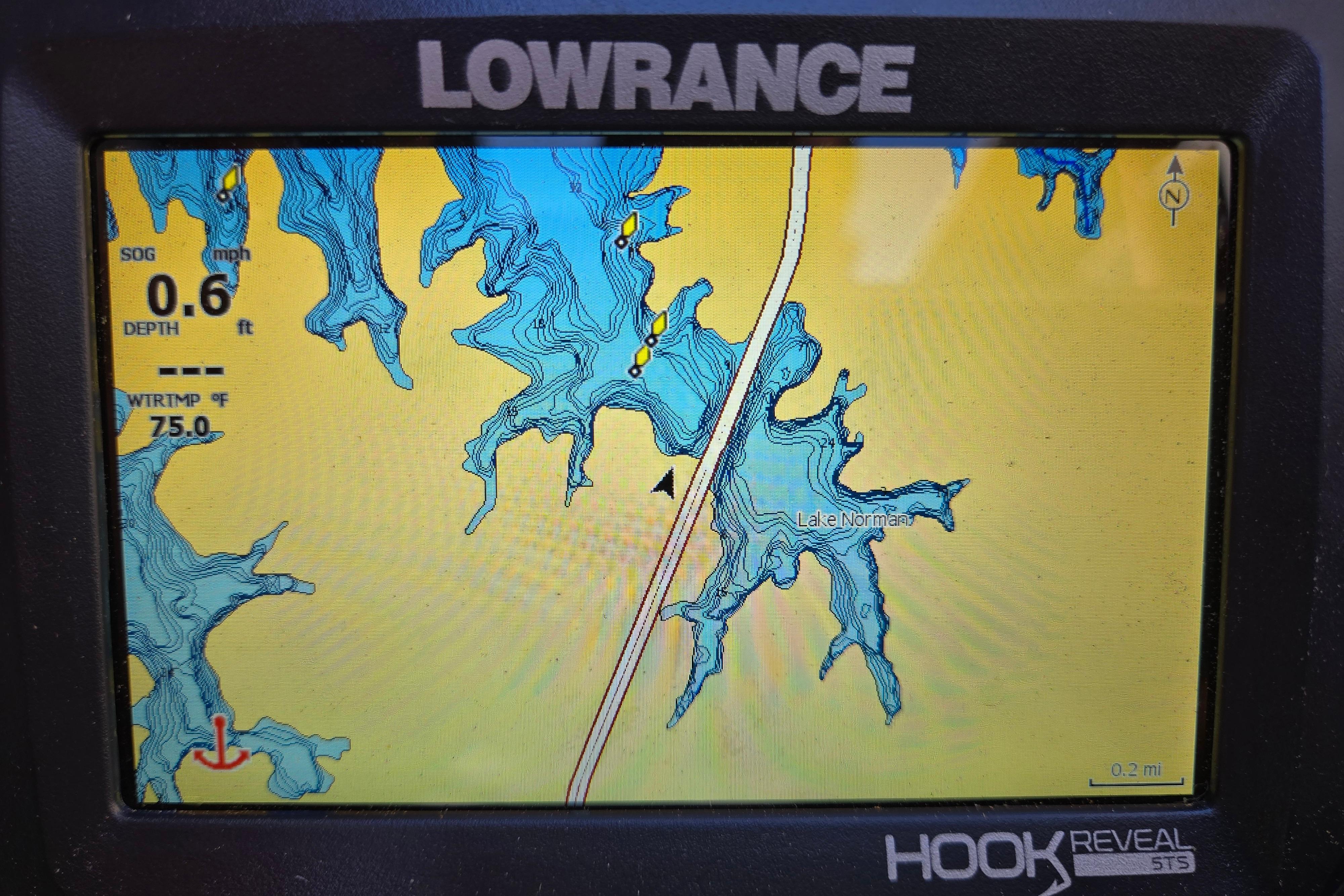 Lowrance GPS display showing Lake Norman map on a 2024 Godfrey Sweetwater 2486 SB.