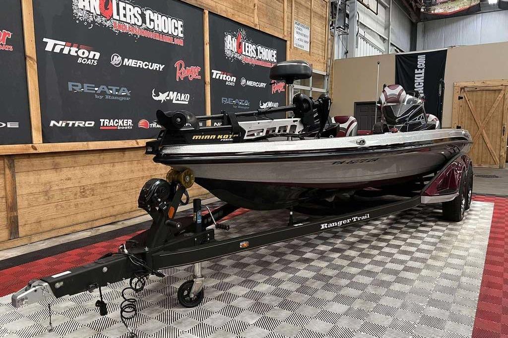 2018 Ranger Z520L boat on display with trailer in showroom setting.
