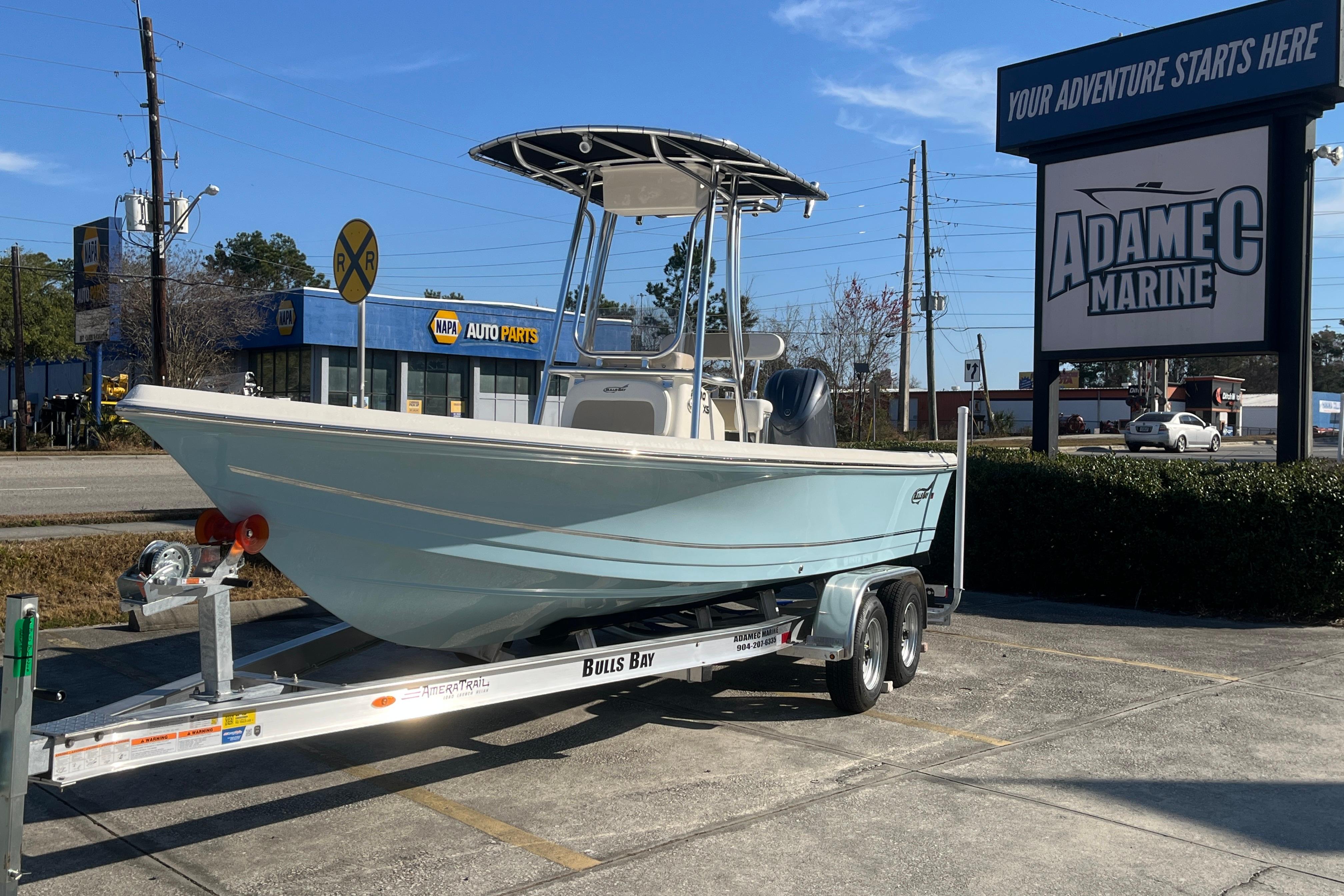 2026 Bulls Bay 2200 boat on trailer at Adamec Marine dealership.
