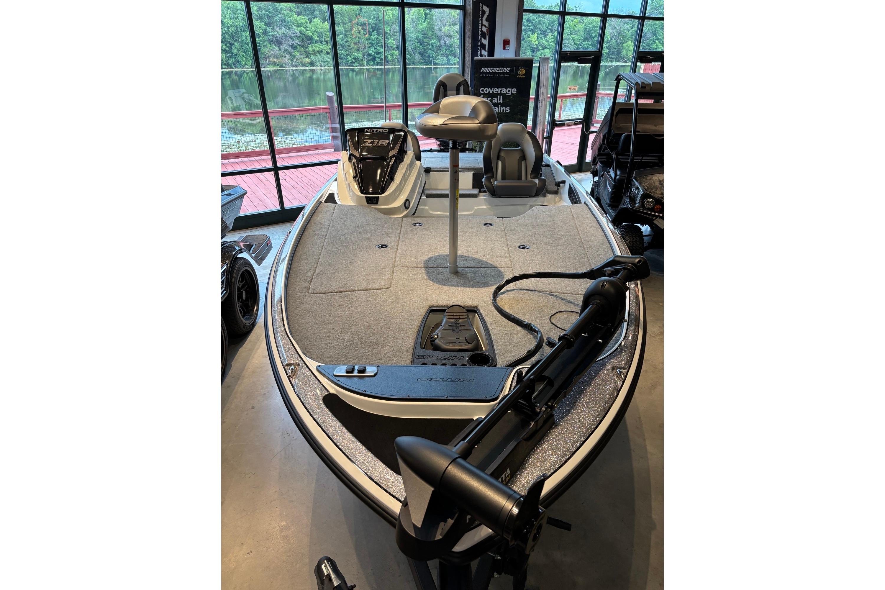 2025 Nitro Z18 boat displayed indoors, featuring a sleek design and modern equipment.
