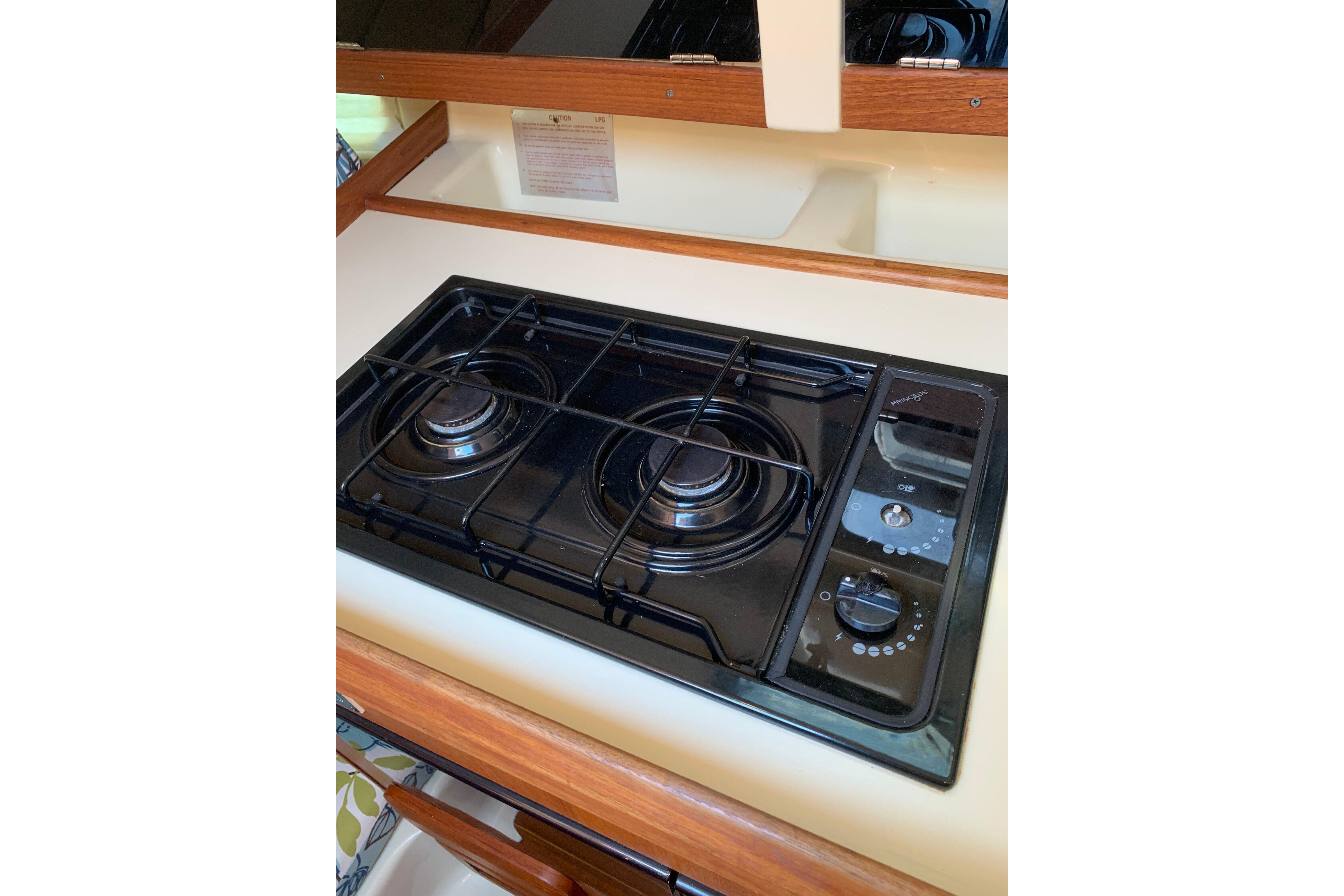 Two-burner stove in 1994 Hunter 29.5 sailboat galley kitchen.