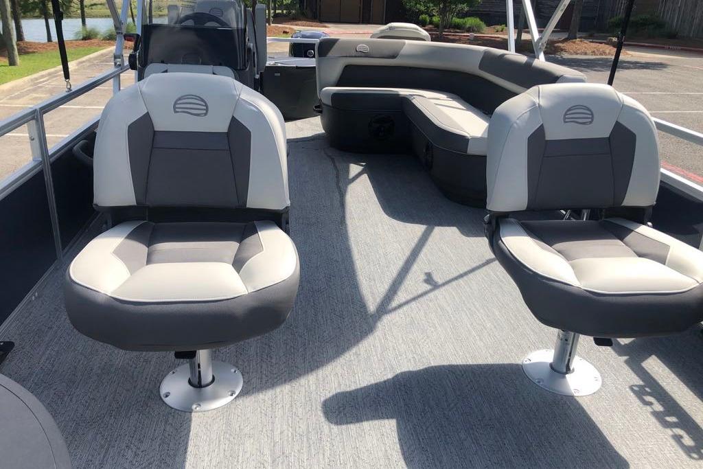 2026 Sun Tracker Bass Buggy 18 DLX pontoon boat interior with comfortable seating.