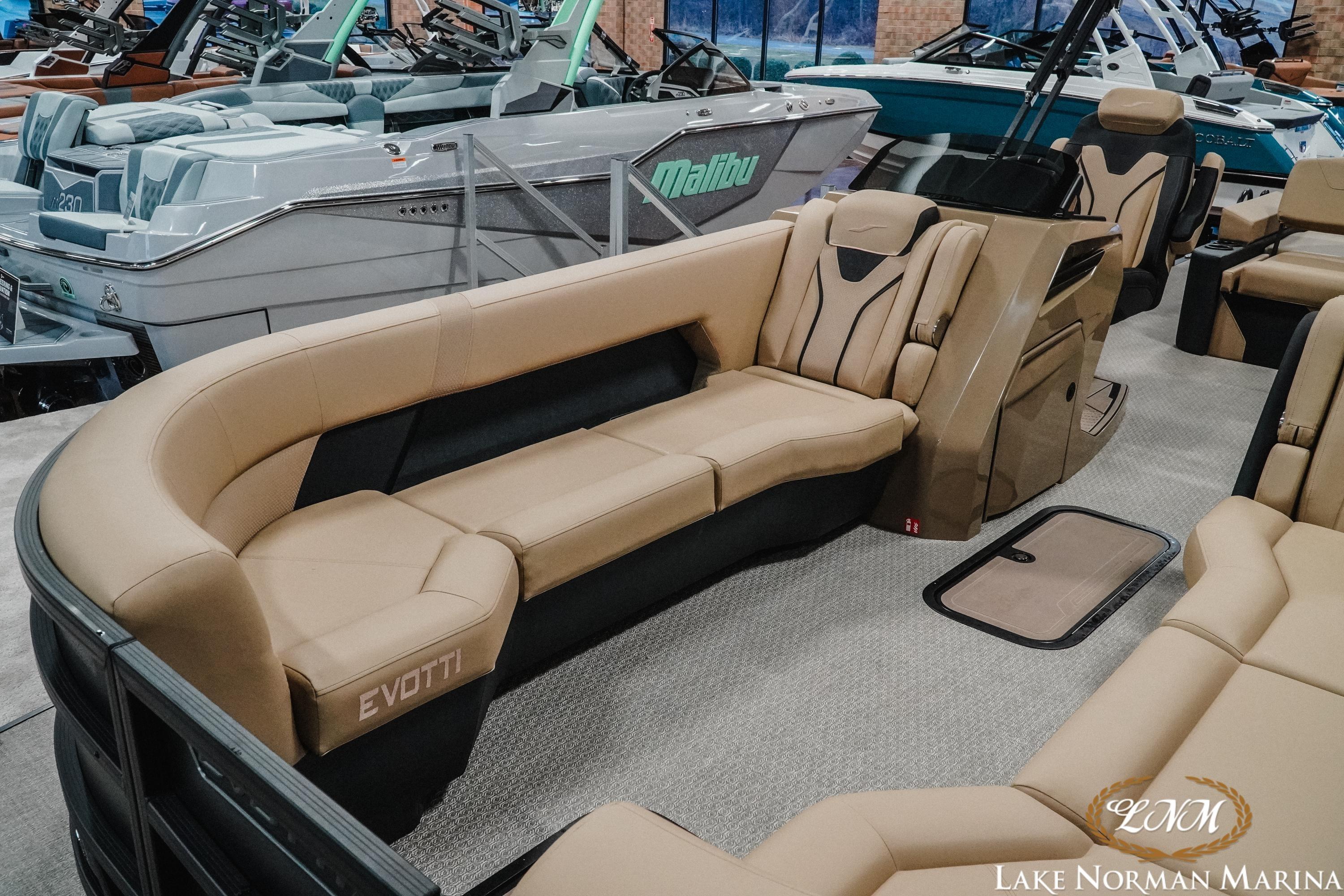 Luxurious 2026 Evotti 725CS boat interior with plush seating at Lake Norman Marina.