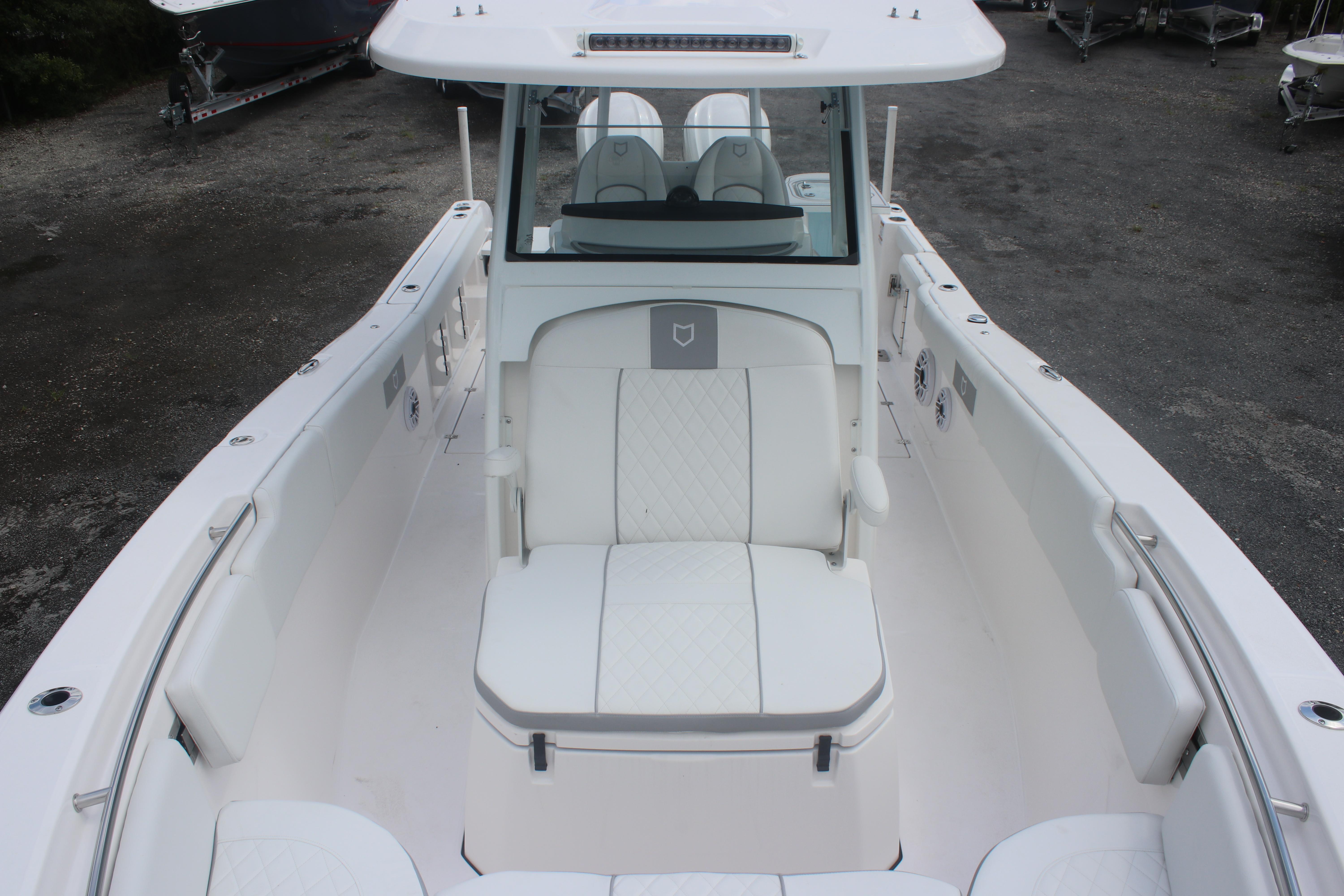 2026 Sea Fox 288 Commander boat interior with white seating and sleek design.