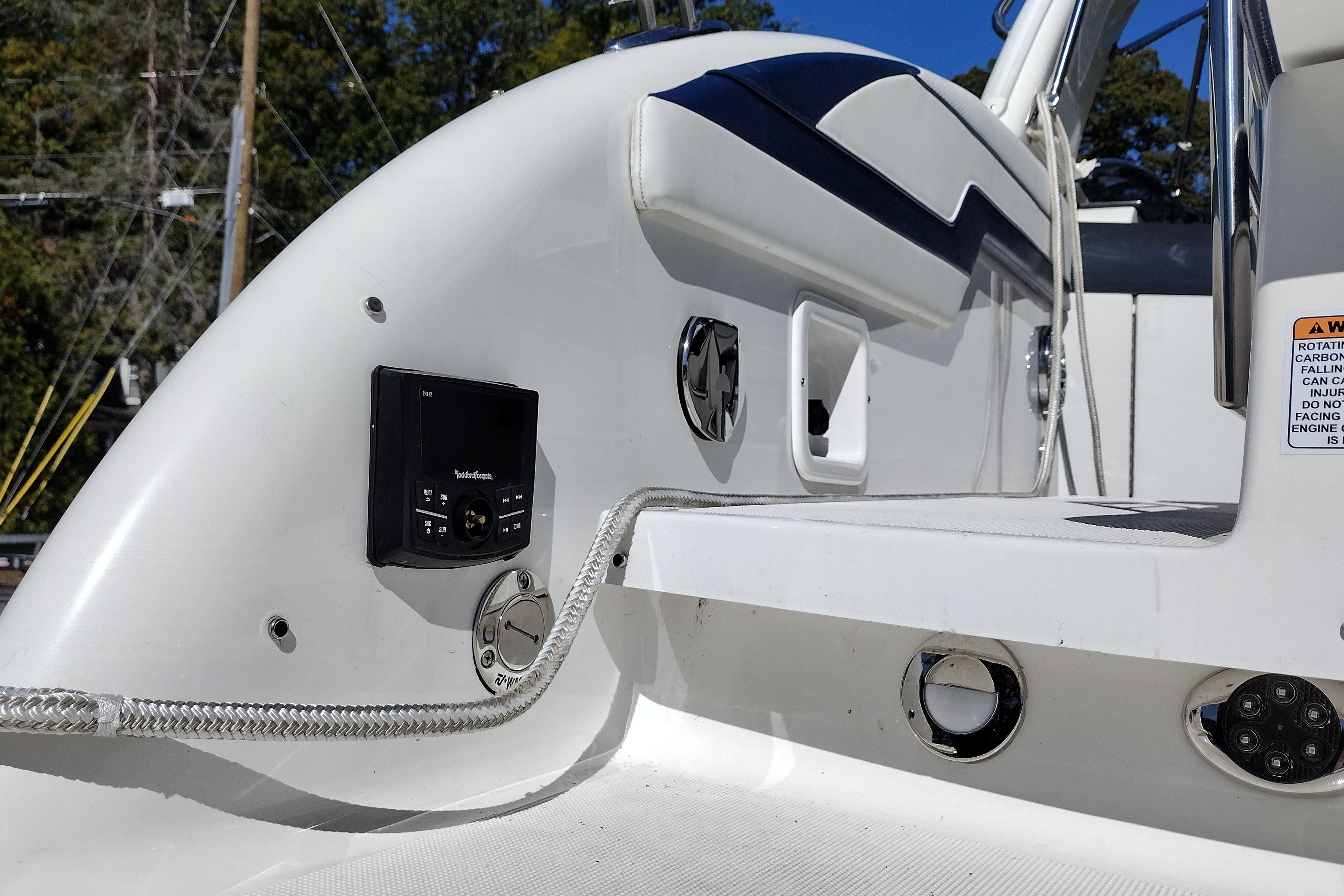 2022 Formula 310 Bowrider boat deck with control panel and sleek design elements.
