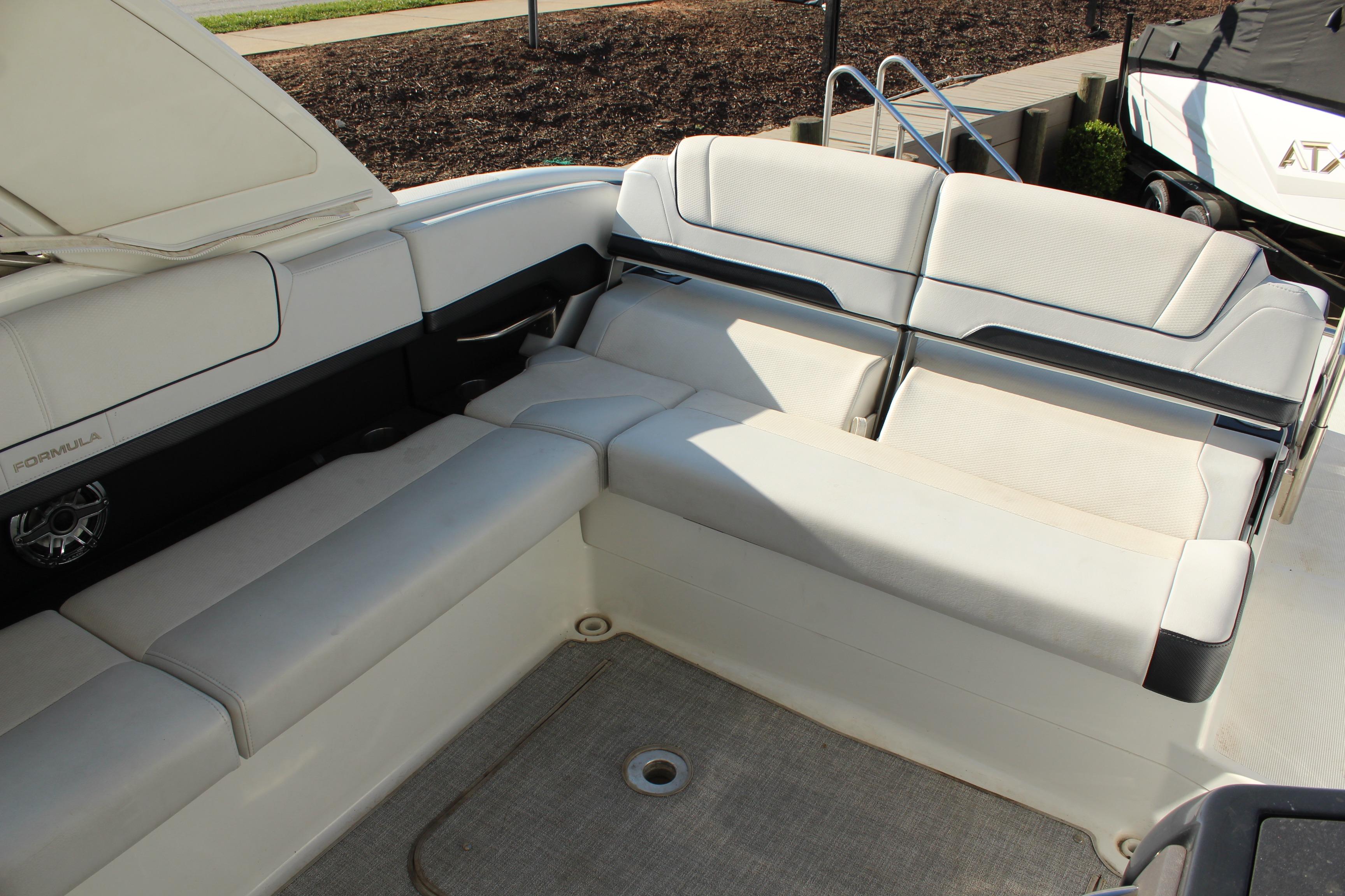 2023 Formula 310 Bowrider I/O boat interior with luxurious seating and modern design.