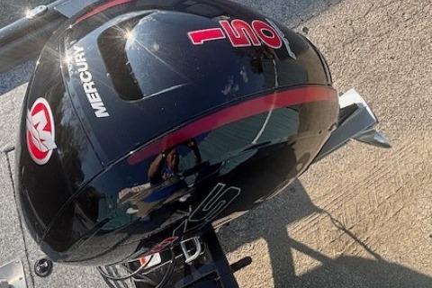 2026 Tracker Pro Team 195 boat with Mercury 150 engine, outdoor setting.