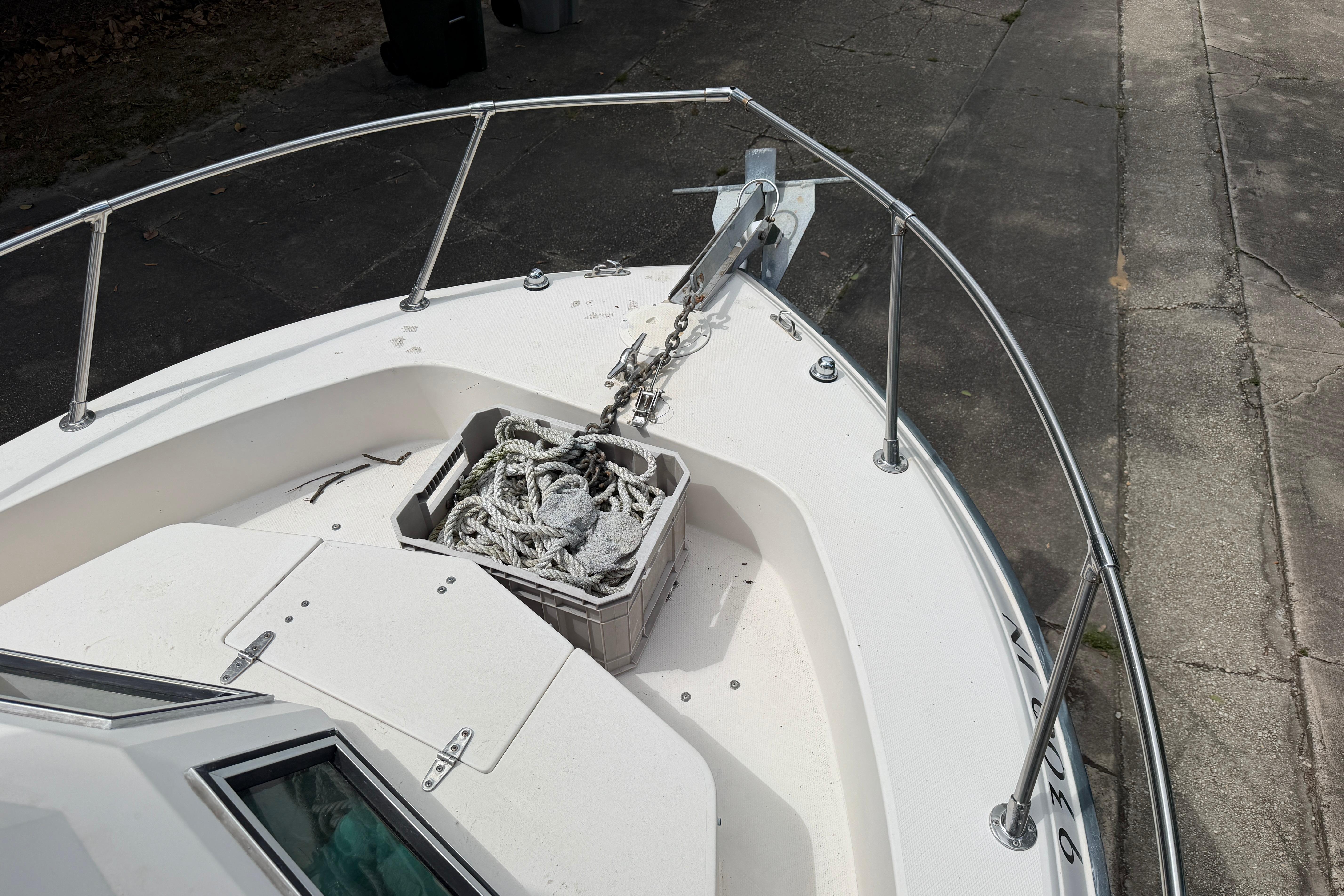 1987 Grady-White Seafarer 226 boat bow with anchor and rope storage.