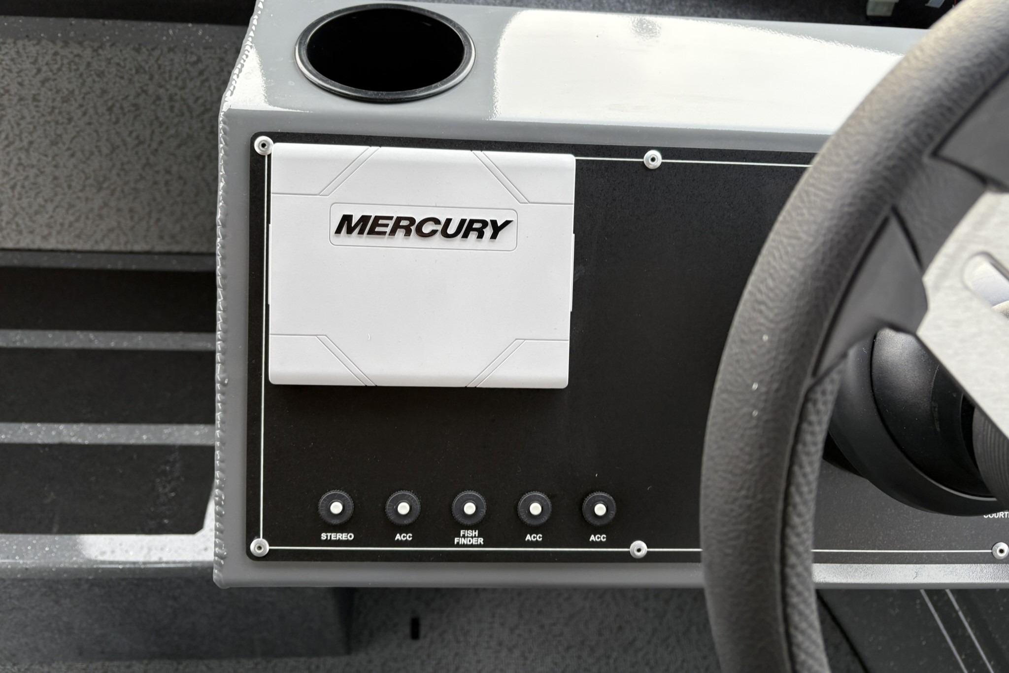 Dashboard of 2024 Spartan 26 Maximus Pro XL with Mercury controls and switches.