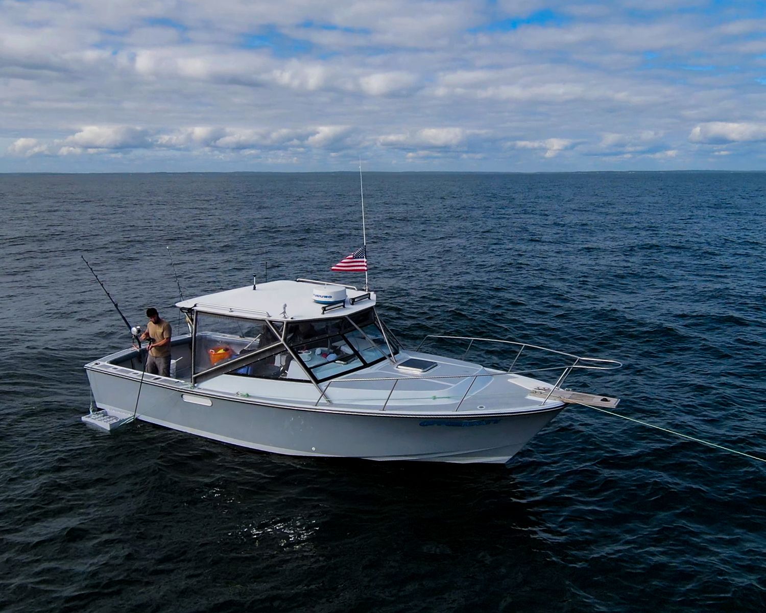 1989 Black Watch Custom 35 boat on open sea.