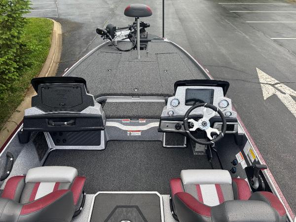 2025 Nitro Z20 XL Pro boat interior with steering console and seating.