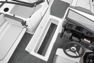 2026 Yamaha Boats AR190 interior with steering wheel and seating area.